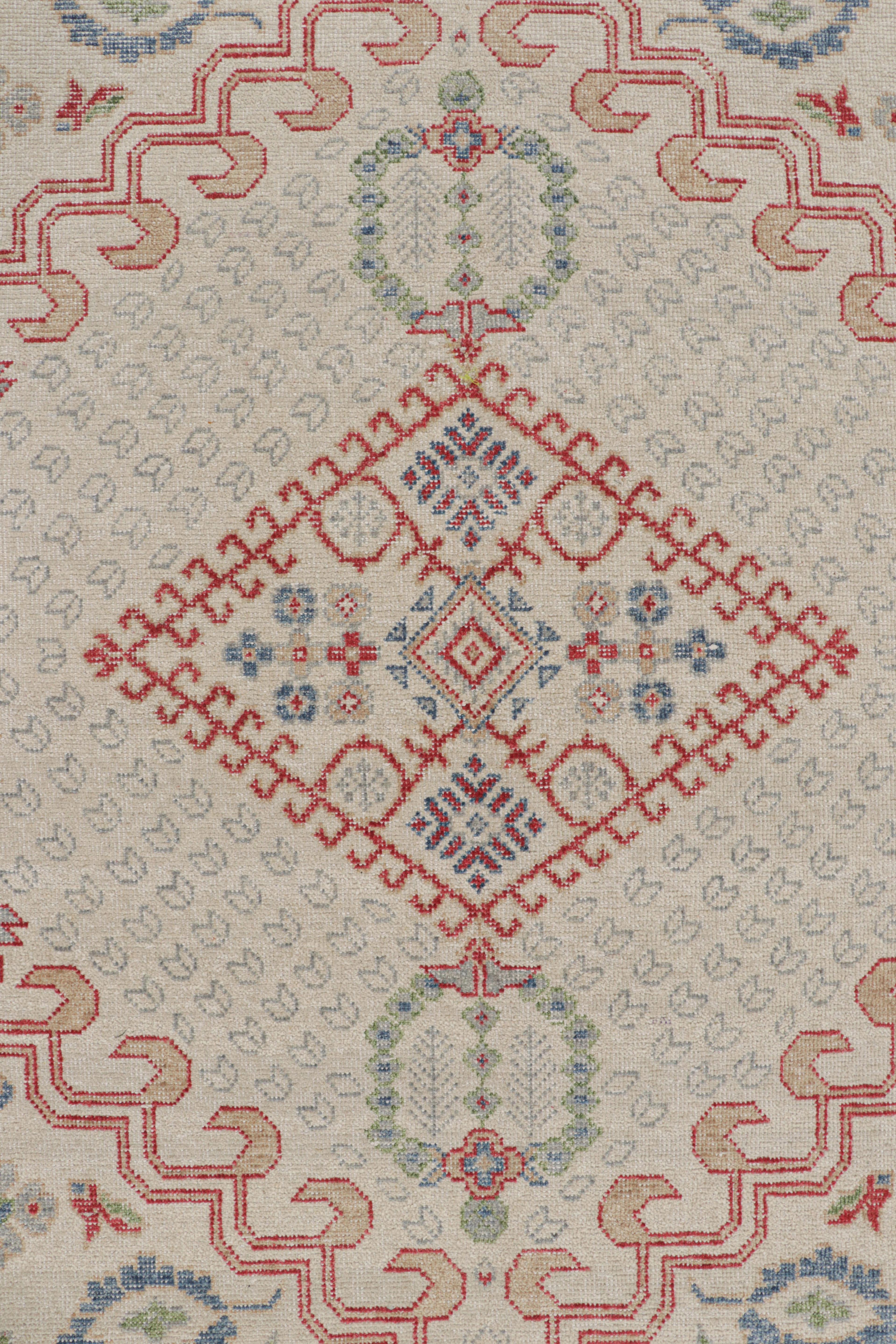 Rug & Kilim’s Distressed Ghiordes Style Rug in Cream, Green, and Red with Medall In New Condition For Sale In Long Island City, NY