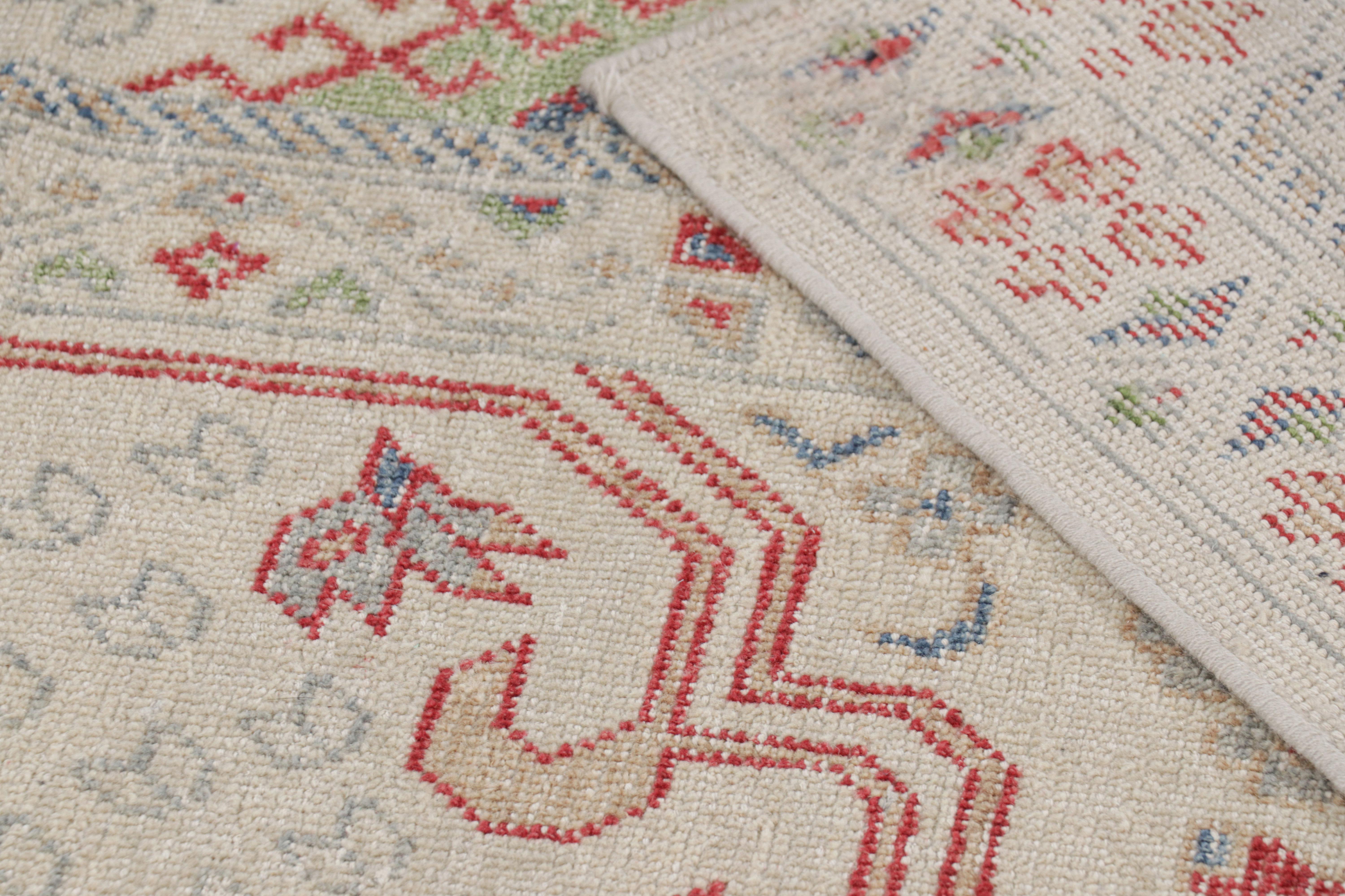 Contemporary Rug & Kilim’s Distressed Ghiordes Style Rug in Cream, Green, and Red with Medall For Sale