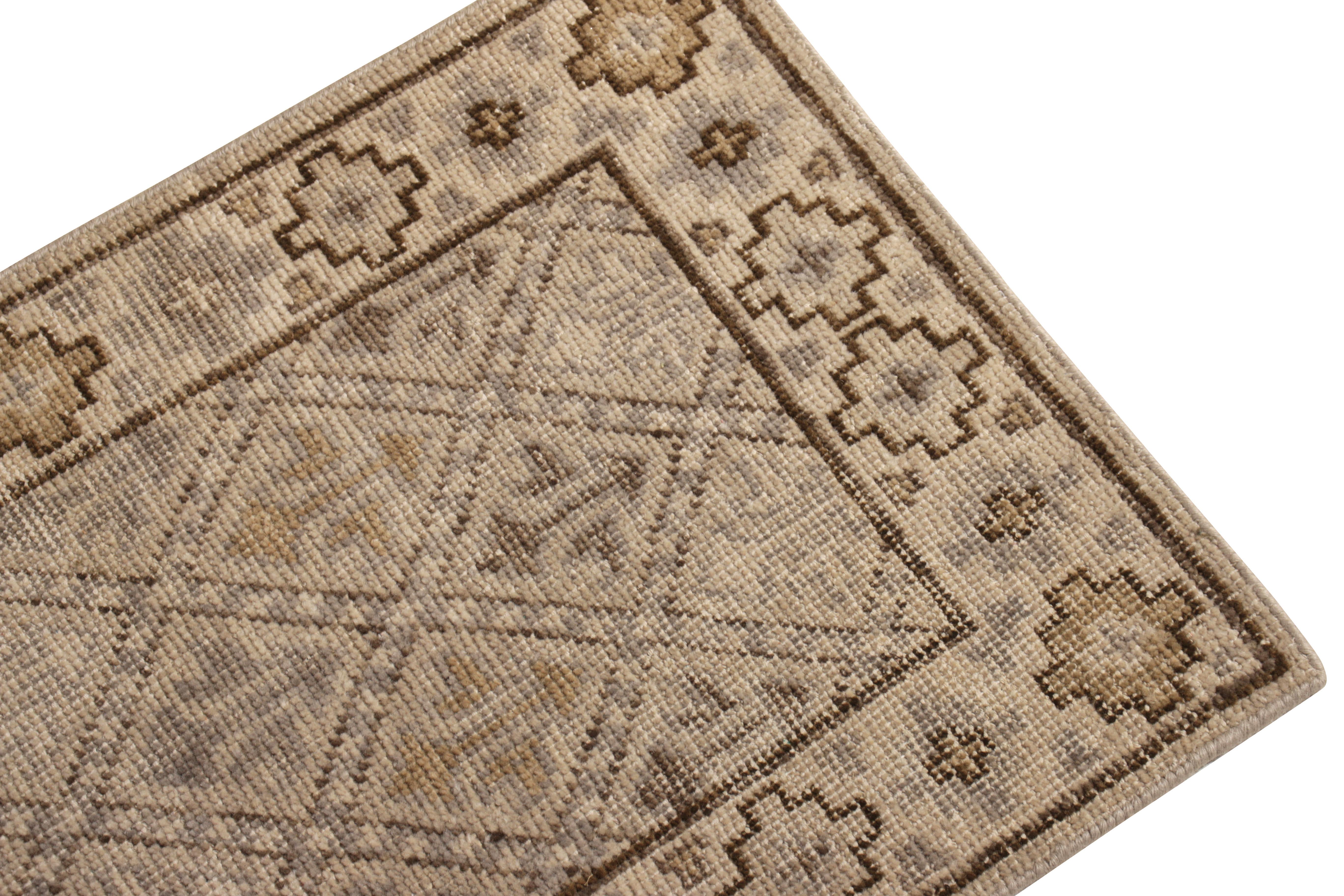 Handmade in a refined, low-pile wool with a comfortable wash achieving this shabby-chic distressed style, this gift sized 2 x 3 rug hails from the Homage collection by Rug & Kilim; both well-suited for wall hanging, doormat, and varied entryway