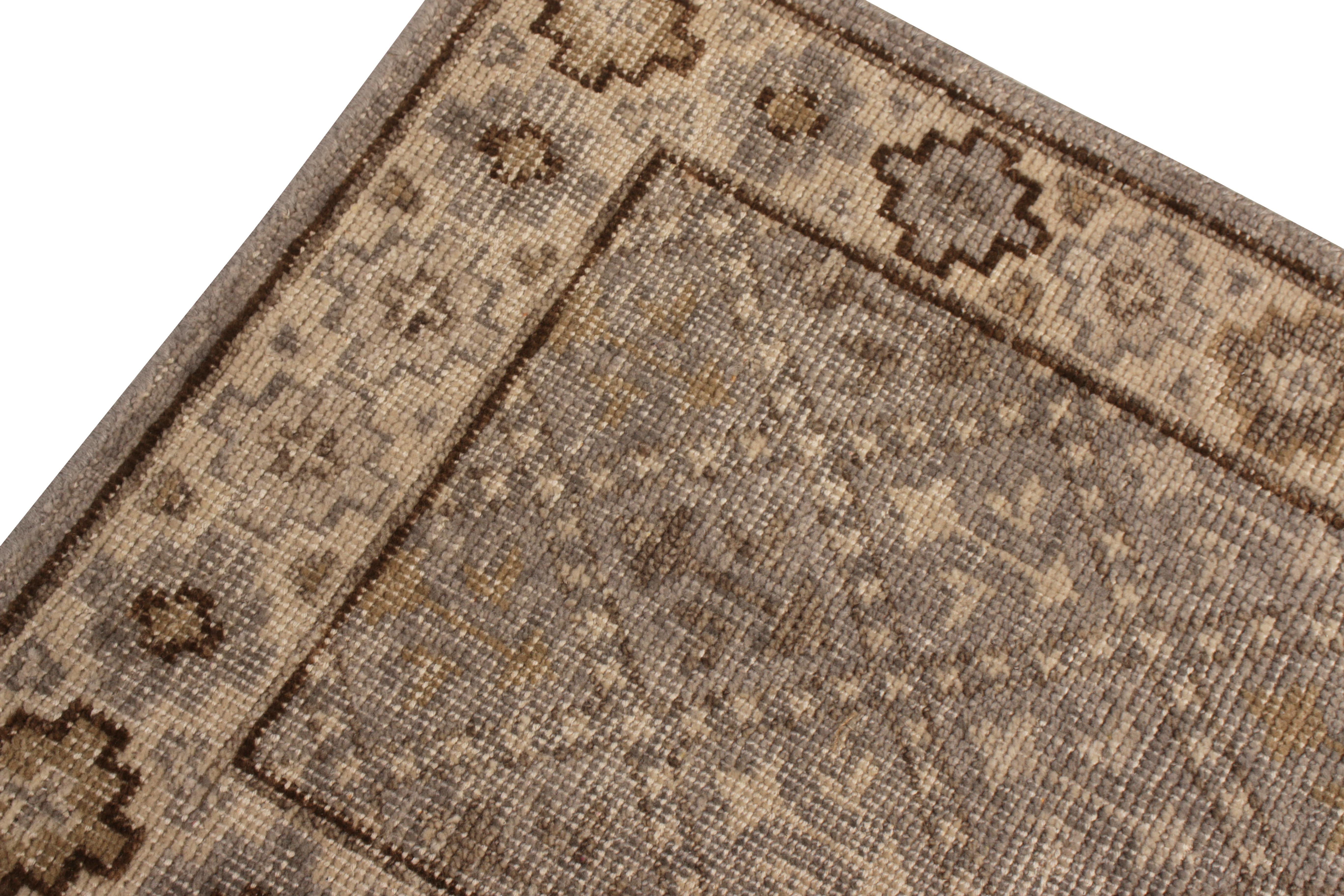 Handmade in a refined, low-pile wool with a comfortable wash achieving this shabby-chic distressed style, this gift sized 2x3 rug hails from the Homage Collection by Rug & Kilim; both well-suited for wall hanging, doormat, and varied entryway