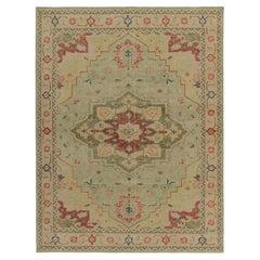 Rug & Kilim’s Distressed Heriz-Serapi Style Rug in Green, Pink & Red Medallion