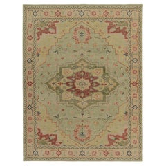 Rug & Kilim’s Distressed Heriz-Serapi Style Rug in Green, Pink & Red Medallion