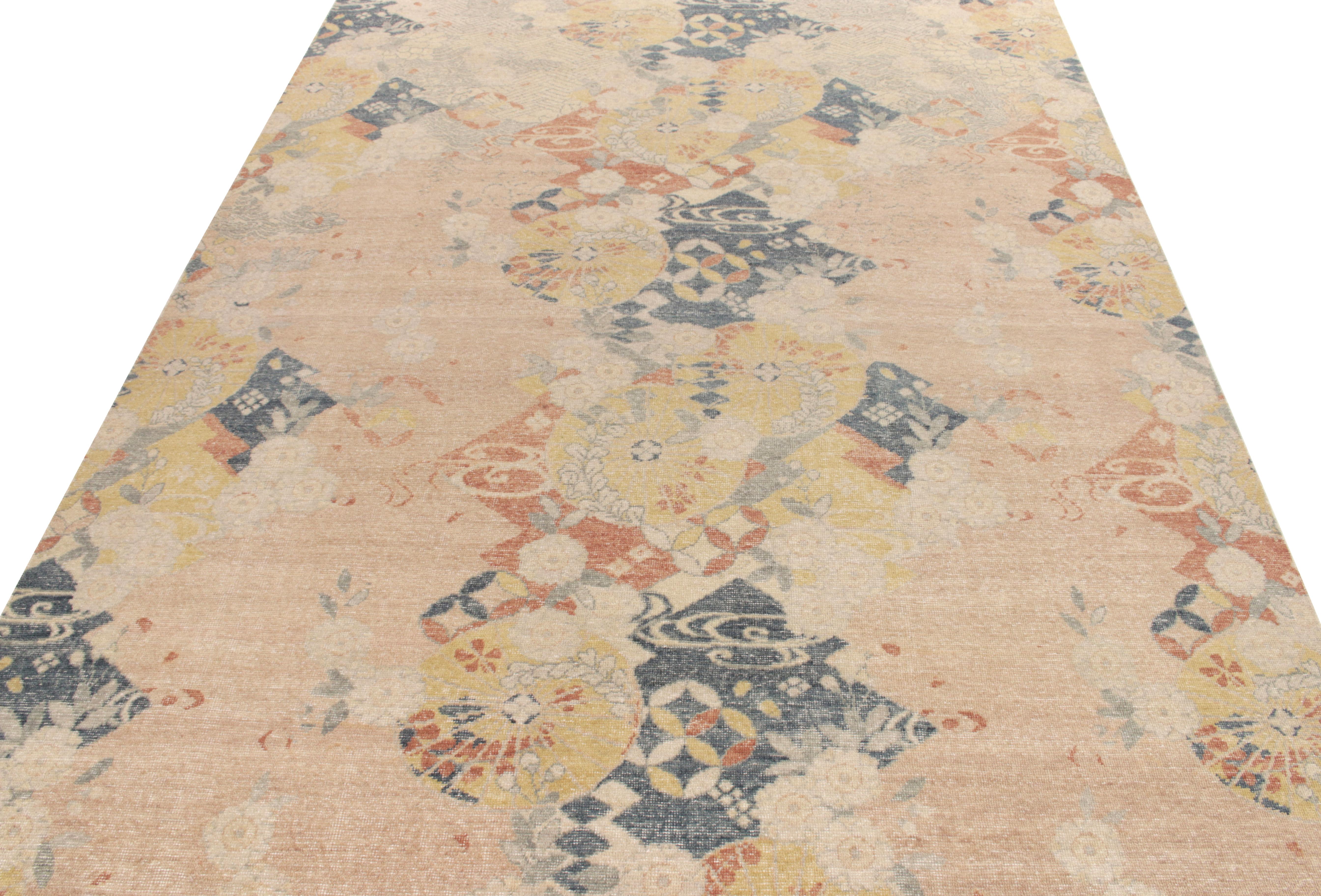 From Rug & Kilim’s Homage collection, a 9x12 distressed style rug with Japanese art deco inspirations playing in muted blue, cream, orange, pink and golden colorways naturally blending with abstract pattern for a shabby chic vibe on the contemporary