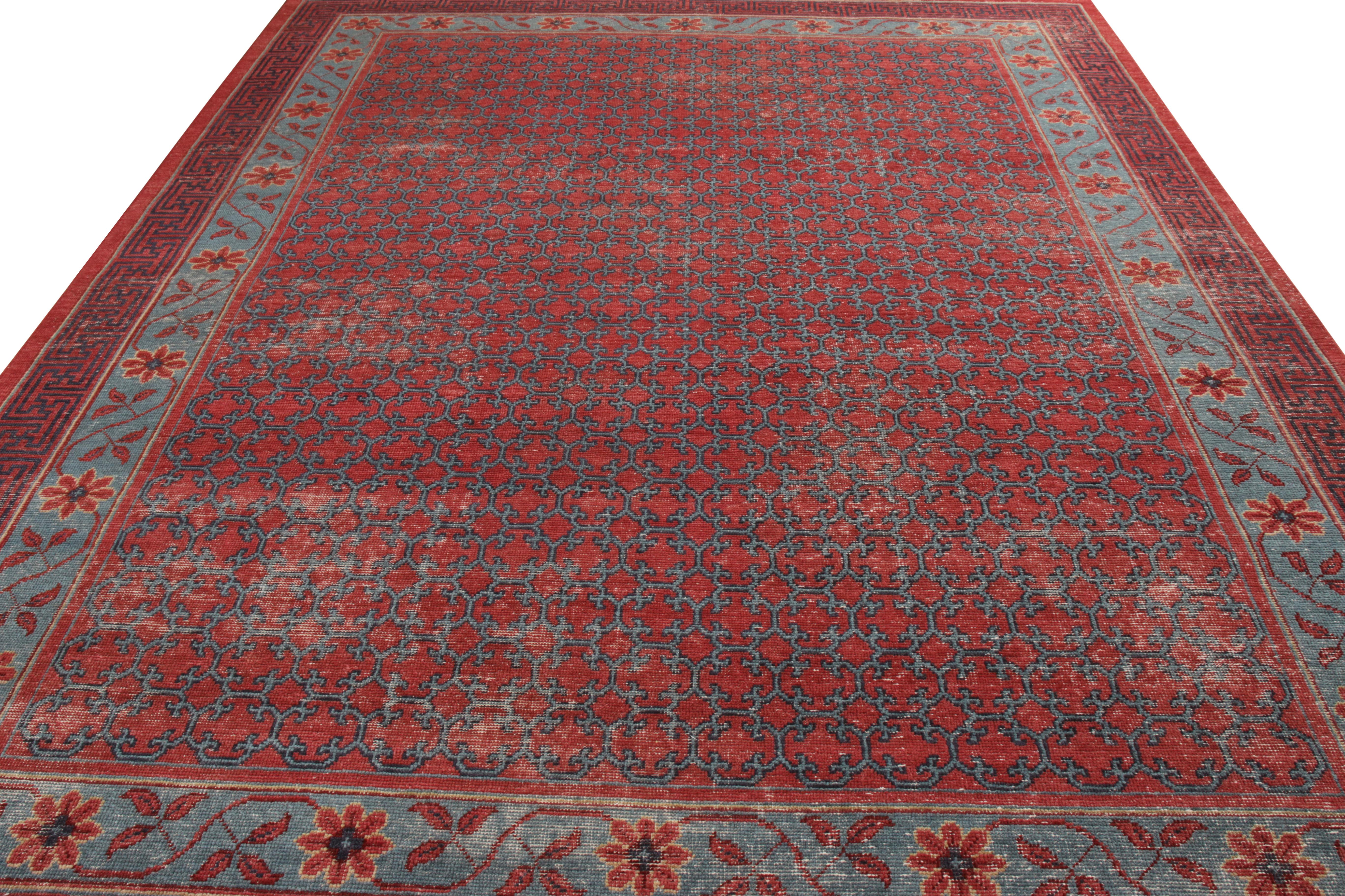 A 9x12 ode to celebrated Khotan rug styles from the classic selections in Rug & Kilim’s Homage Collection. Hand knotted in wool with a shabby-chic, distressed texture, enjoying complementary blue and velvet red hues. Further sporting a sophisticated