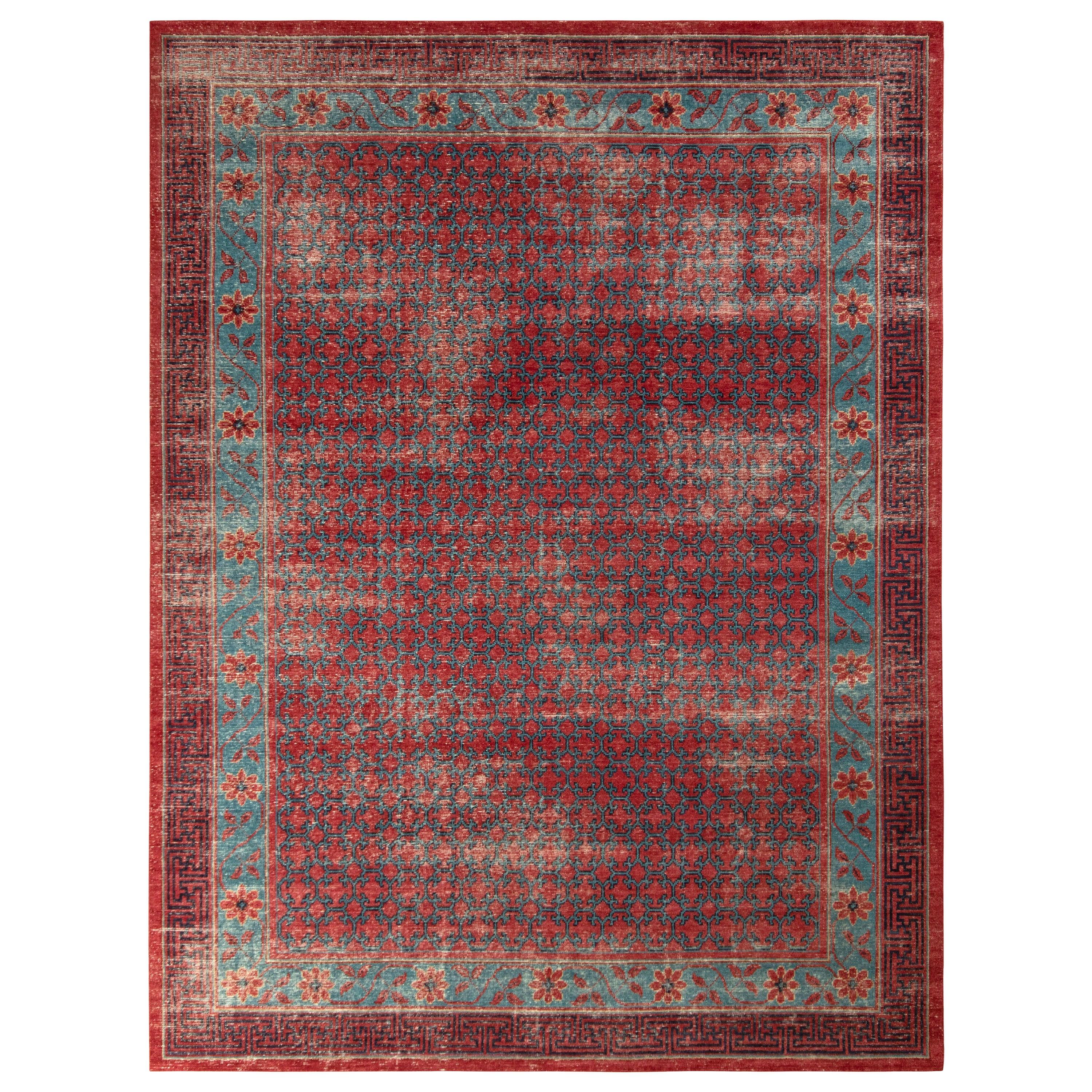 Rug & Kilim’s Distressed Khotan Style Rug in Blue and Orange Geometric Pattern