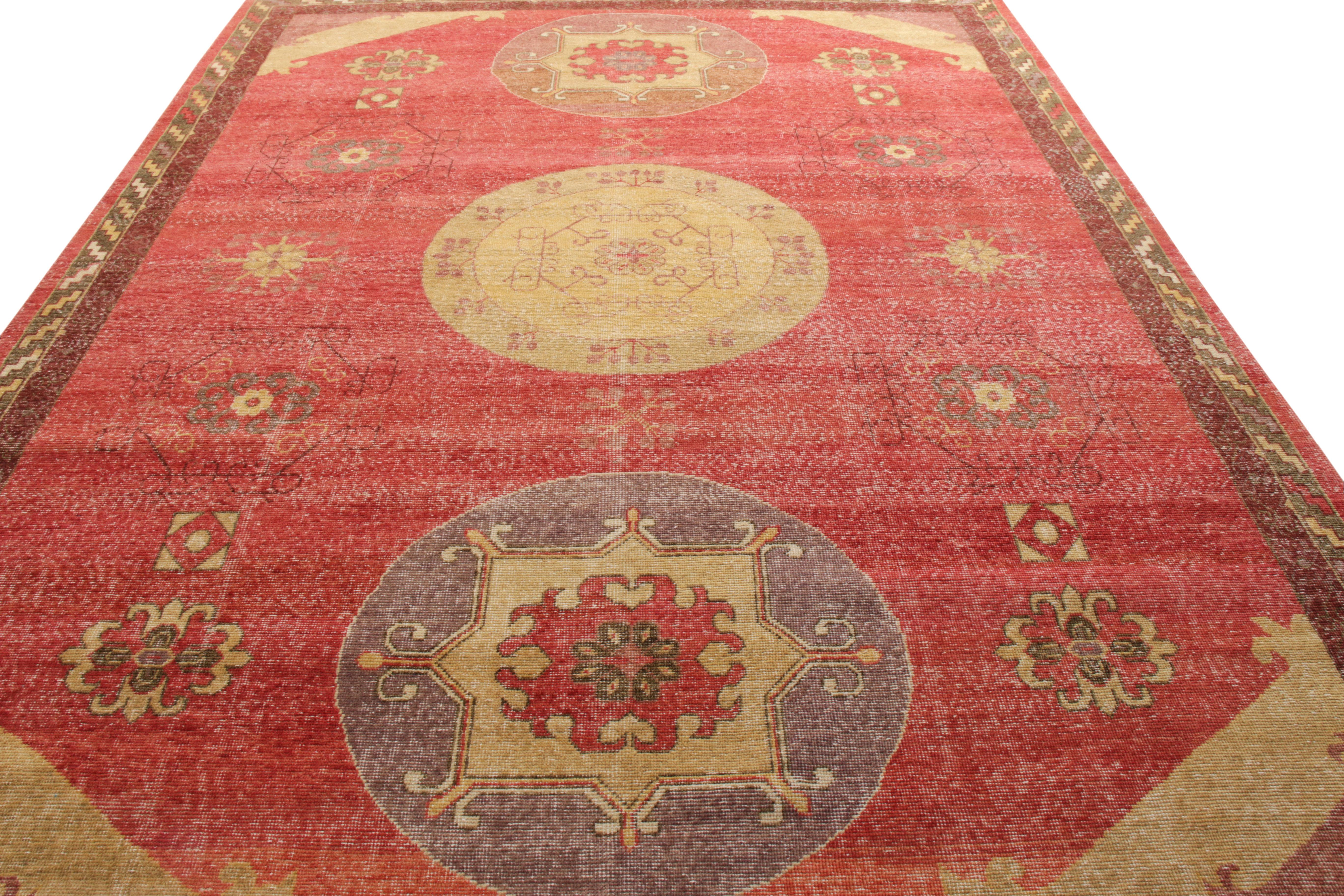 A rich hand knotted wool rug design from Rug & Kilim’s Homage Collection. Exemplified in this 9x12 edition, this distressed style rug witnesses a cheerful play of red and beige-gold tones gracefully complimenting the intricate medallion pattern on