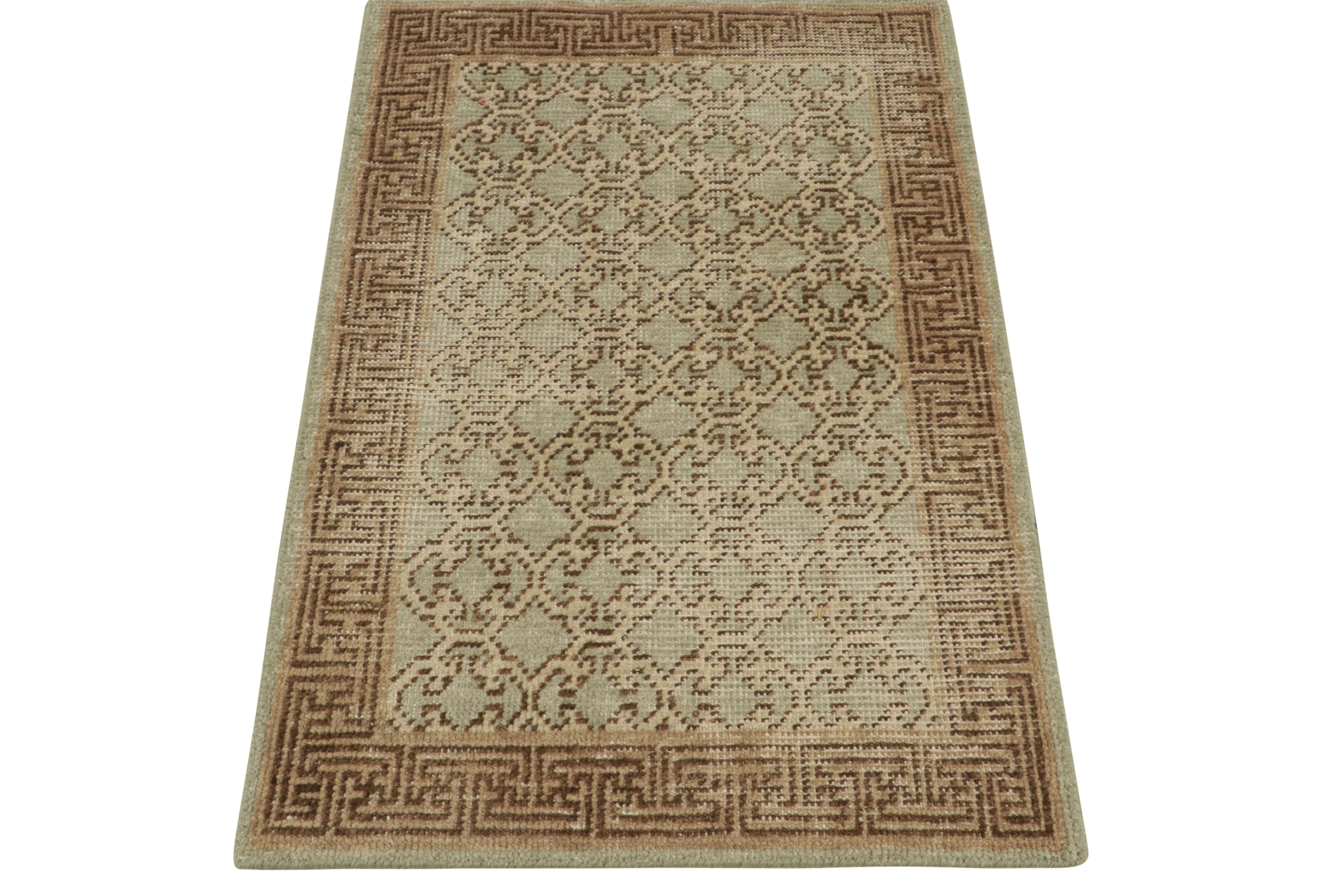 From Rug & Kilim’s Homage collection, a 2x3 hand-knotted accent rug enjoying a modern take on rustic classics. Inspired by antique Khotan rugs, this gift-sized scatter rug witnesses an interlocking fret pattern border and field trellis patterns on a