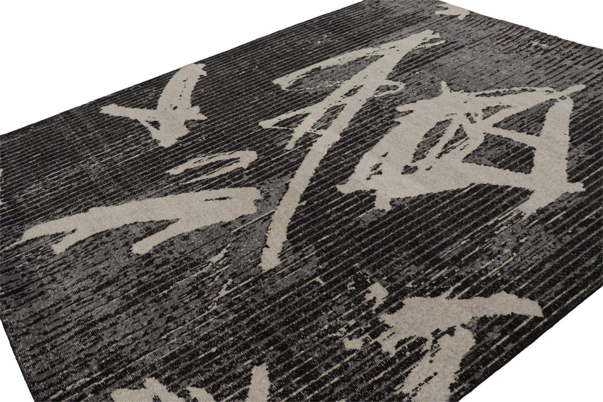 Dieser moderne, handgeknüpfte Wollteppich in der Größe 8x10 ist eine neue Ergänzung der Homage Collection'S von Rug & Kilim.

Über das Design: 

Ein handgeknüpfter Teppich im Format 8x10, der ein modernes geometrisches Muster mit dem Stil des