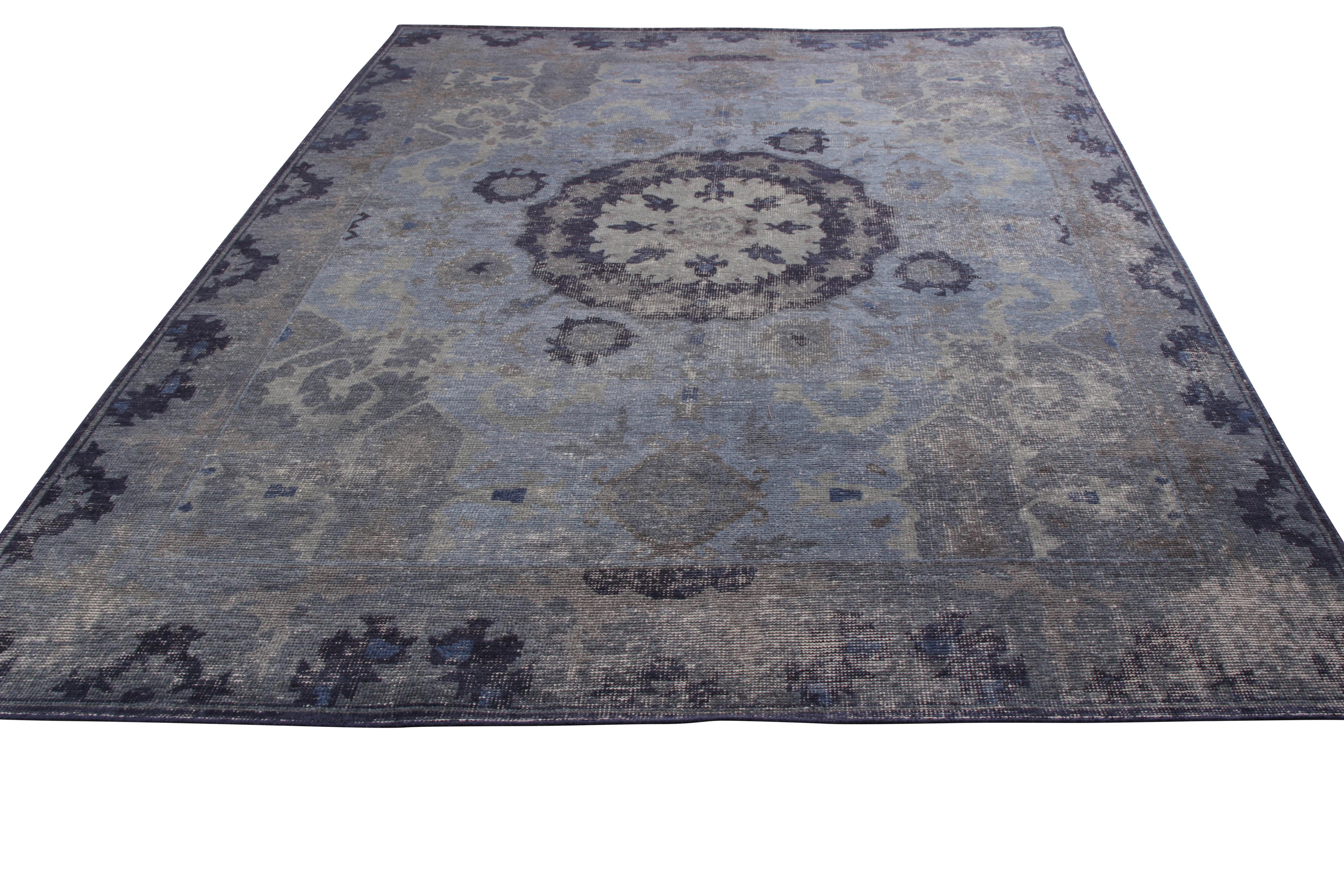 Hand knotted in wool, an 8 x 10 ode to classic rug styles in Rug & Kilim’s Homage Collection. Enjoying sophisticated blue and gray colors in medallion and floral patterns with a distressed aesthetic unique to this collection. 

Further on the