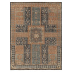 Rug & Kilim’s Distressed Persian Style Rug in Blue & Orange Garden Pattern