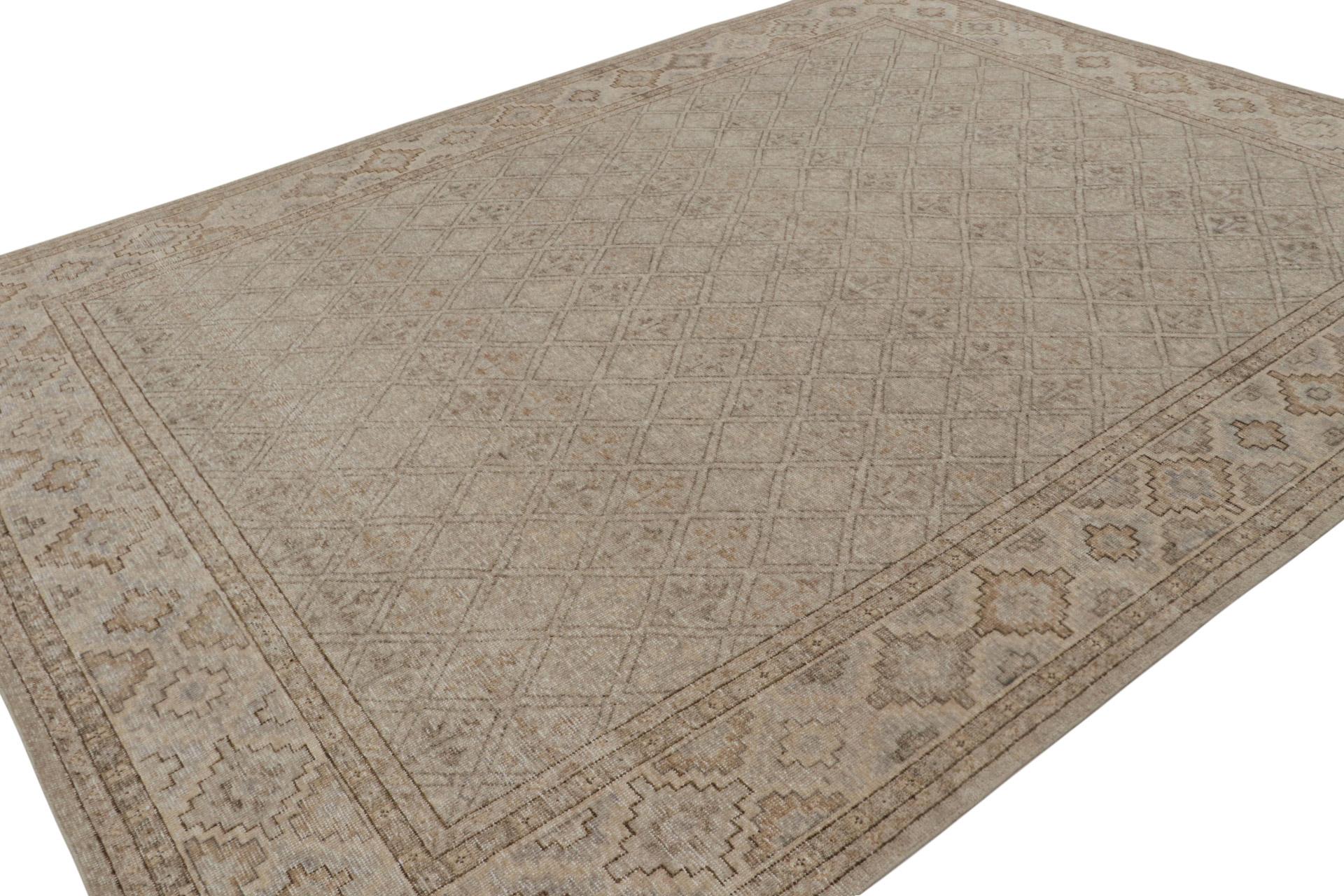 This 9×12 rug is a new addition to the Homage Collection by Rug & Kilim.

On the Design: 

Hand knotted in wool, this piece enjoys an elaborate geometric pattern in forgiving beige, gray, and blue. Keen eyes will admire a natural play of classic