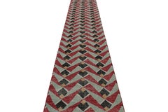 Rug & Kilim’s Distressed Runner in Red and Blue Geometric Patterns