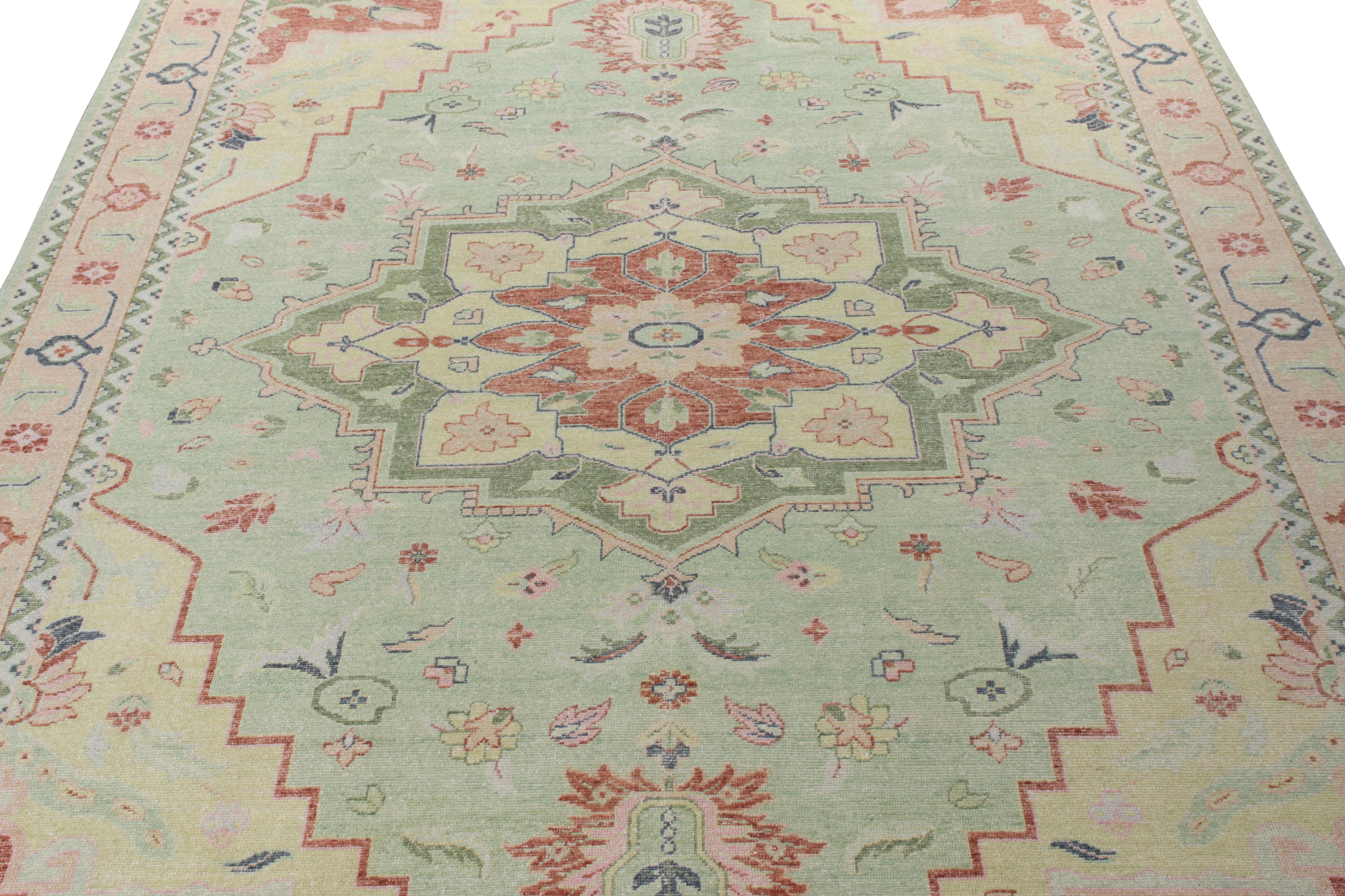 Rug & Kilim presents this 10x14 hand-knotted wool piece from its Homage Collection. Drawing inspiration from the most distinguished classic Heriz-Serapi rug sensibilities, the rug features a splendid medallion pattern in serene hues of green, pink