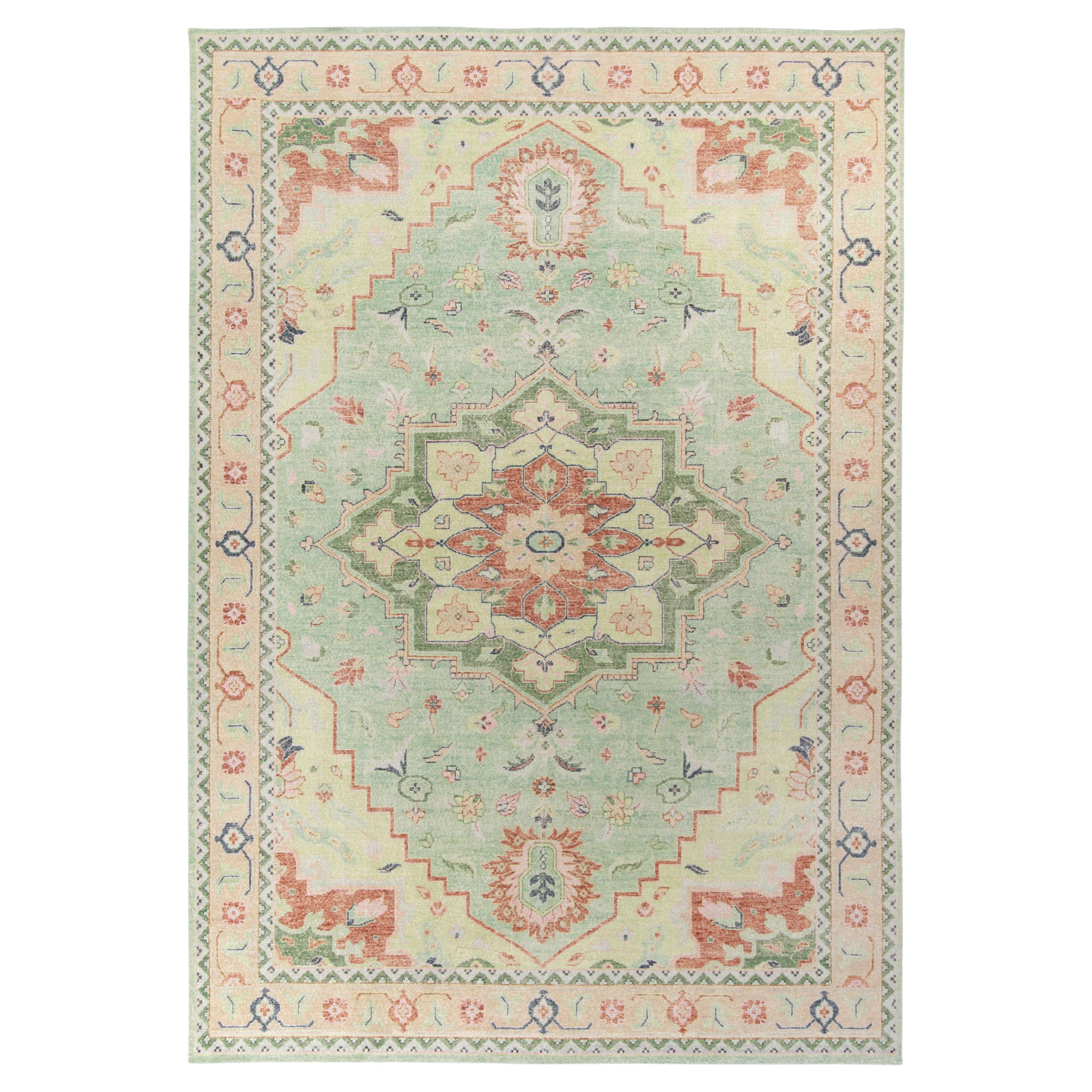 Rug & Kilim’s Distressed Serapi Style Rug in Green, Red Medallion Pattern
