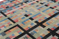 Rug & Kilim’s Distressed Square Rug in Polychromatic Geometric Patterns