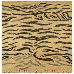 Rug & Kilim’s Distressed Square Tiger Skin Rug in Gold, Black and Gray Tones