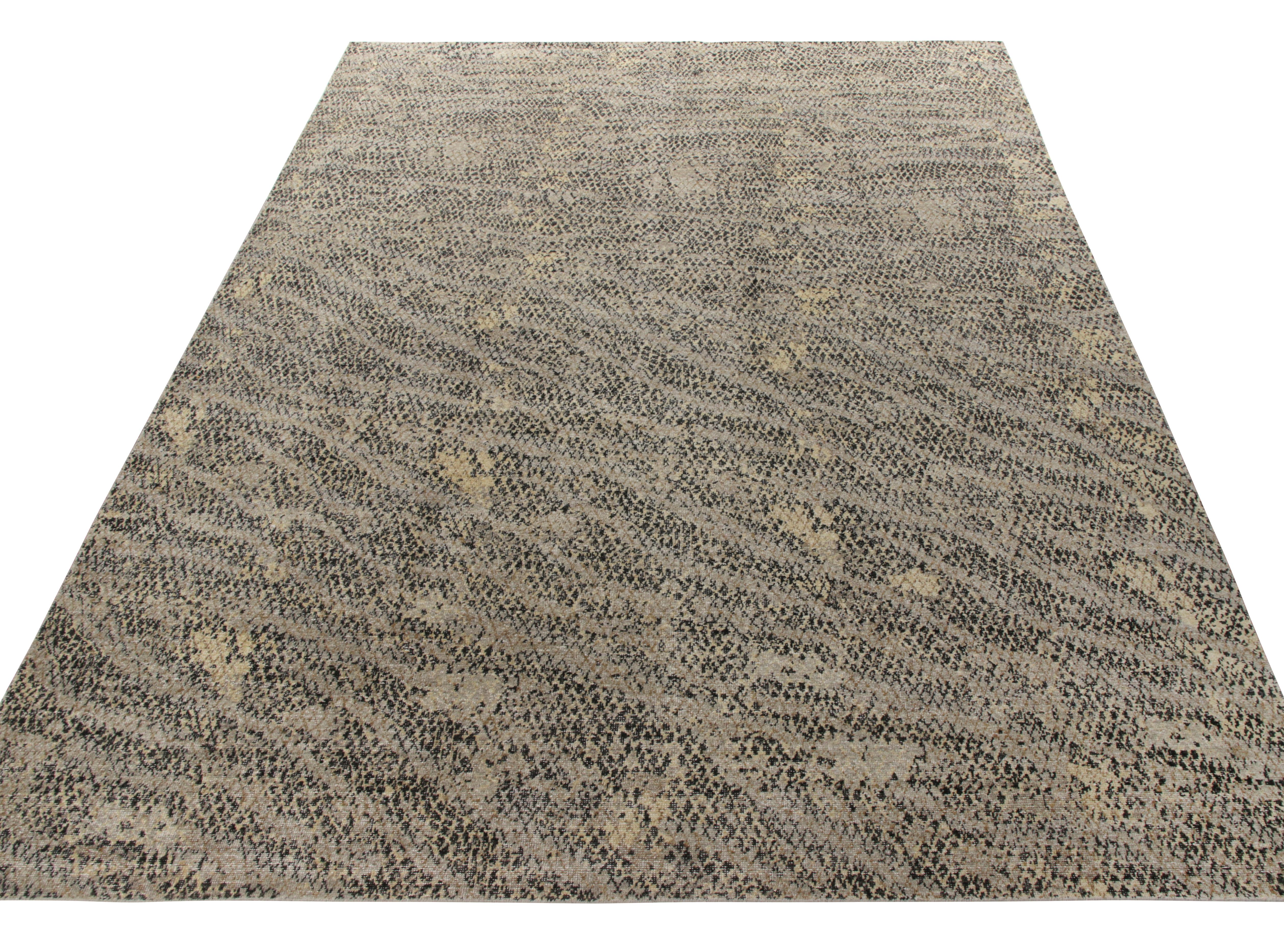Un tapis 10x14 noué à la main dans un style vieilli de la Collection Homage de Rug & Kilim. Ce cadre moderne porte les traits caractéristiques de notre ligne Dots, où un motif pointillé méticuleux s'épanouit à travers le tissage dans un délicieux