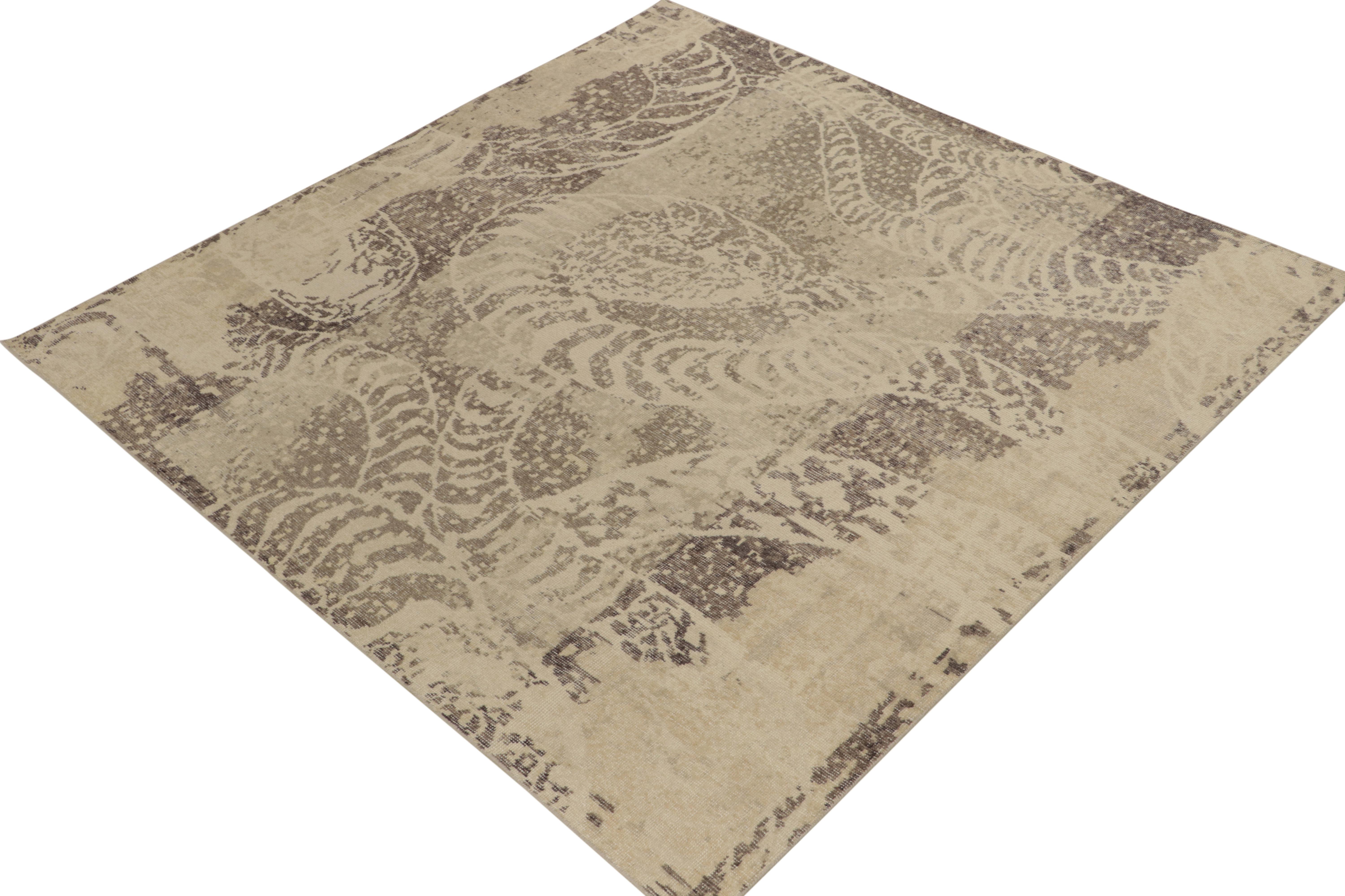From Rug & Kilim’s Homage collection, a square distressed style abstract rug relishing a forgiving play of beige-brown and gray for a comfortable classic allure. Inspired by abstraction of animal skin rugs, the 8x8 vision enjoys subtlety of color