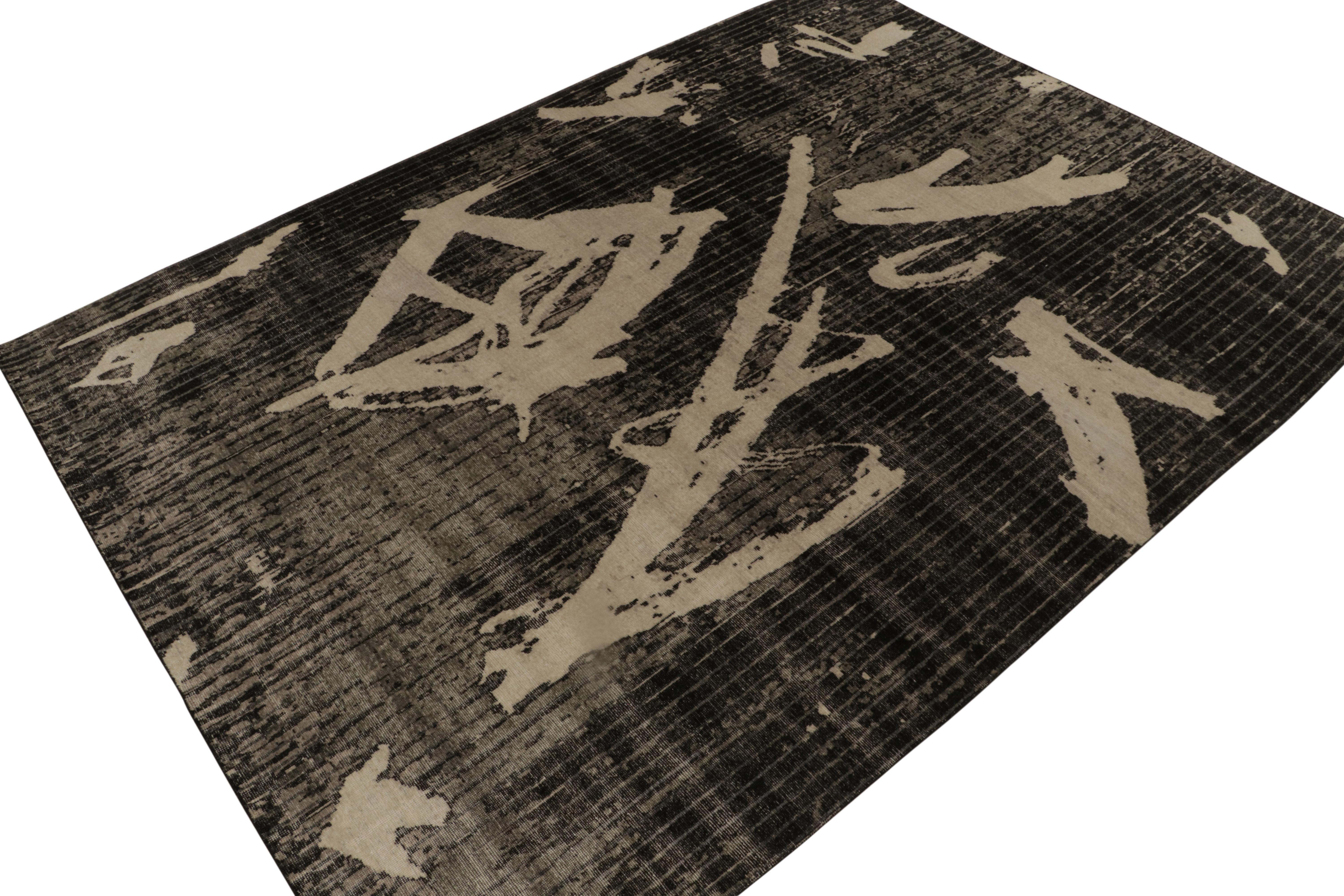 A 10x14 hand-knotted wool rug from Rug & Kilim’s Homage Collection—a smart encyclopedia of patterns and iconic aesthetics. 

On the Design: This contemporary vision boasts abstract expressionism uniquely minimal in grayish white on black with a
