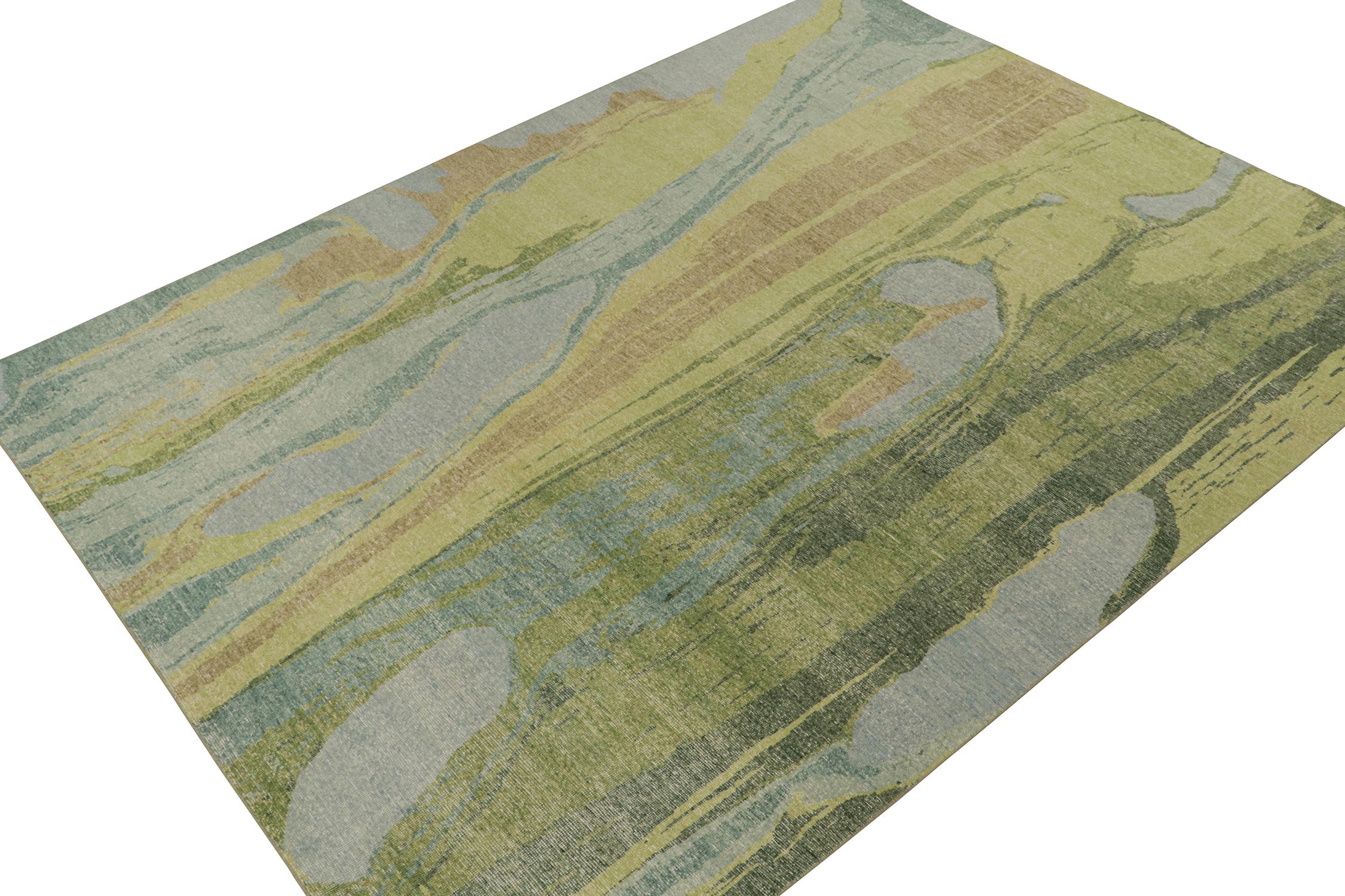 This contemporary 9x12 abstract rug is a new addition to the Homage Collection by Rug & Kilim.

Further on the design:

Hand-knotted in wool and cotton, this design evokes a fluid play blue, green, beige, and gold paint strokes. Keen eyes might