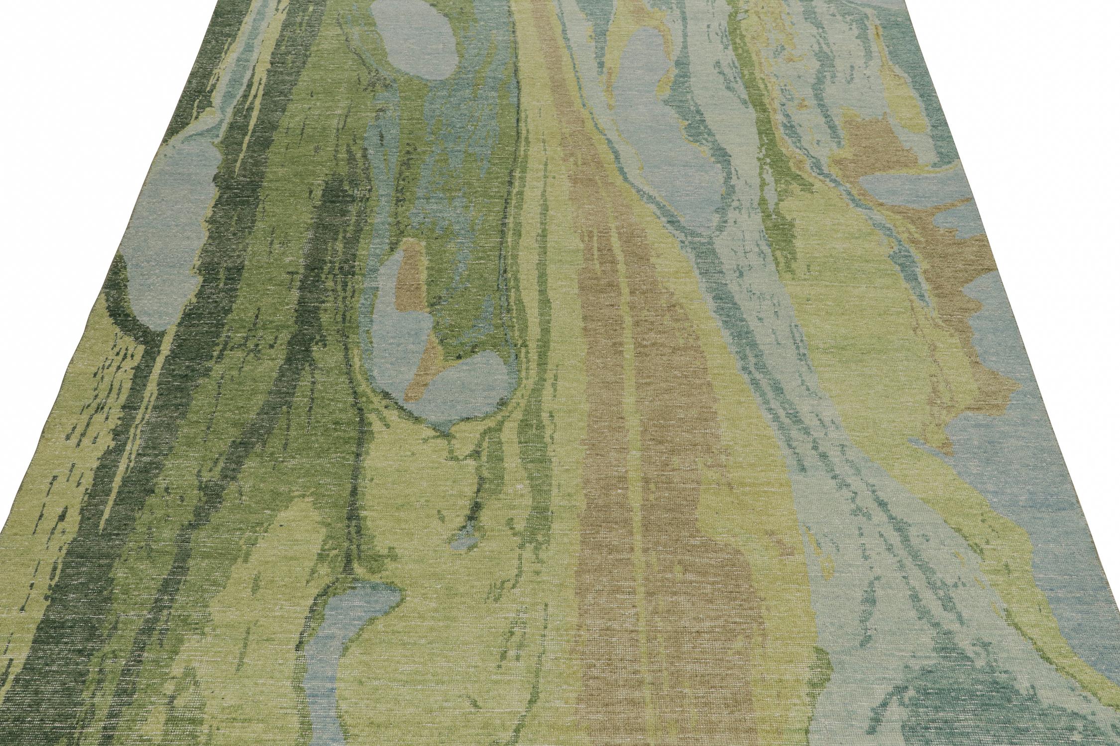 This contemporary 8x10 abstract rug is a new addition to the Homage Collection by Rug & Kilim.

Further On the Design:

Hand-knotted in wool and cotton, this design evokes a fluid play blue, green, beige, and gold paint strokes. Keen eyes might