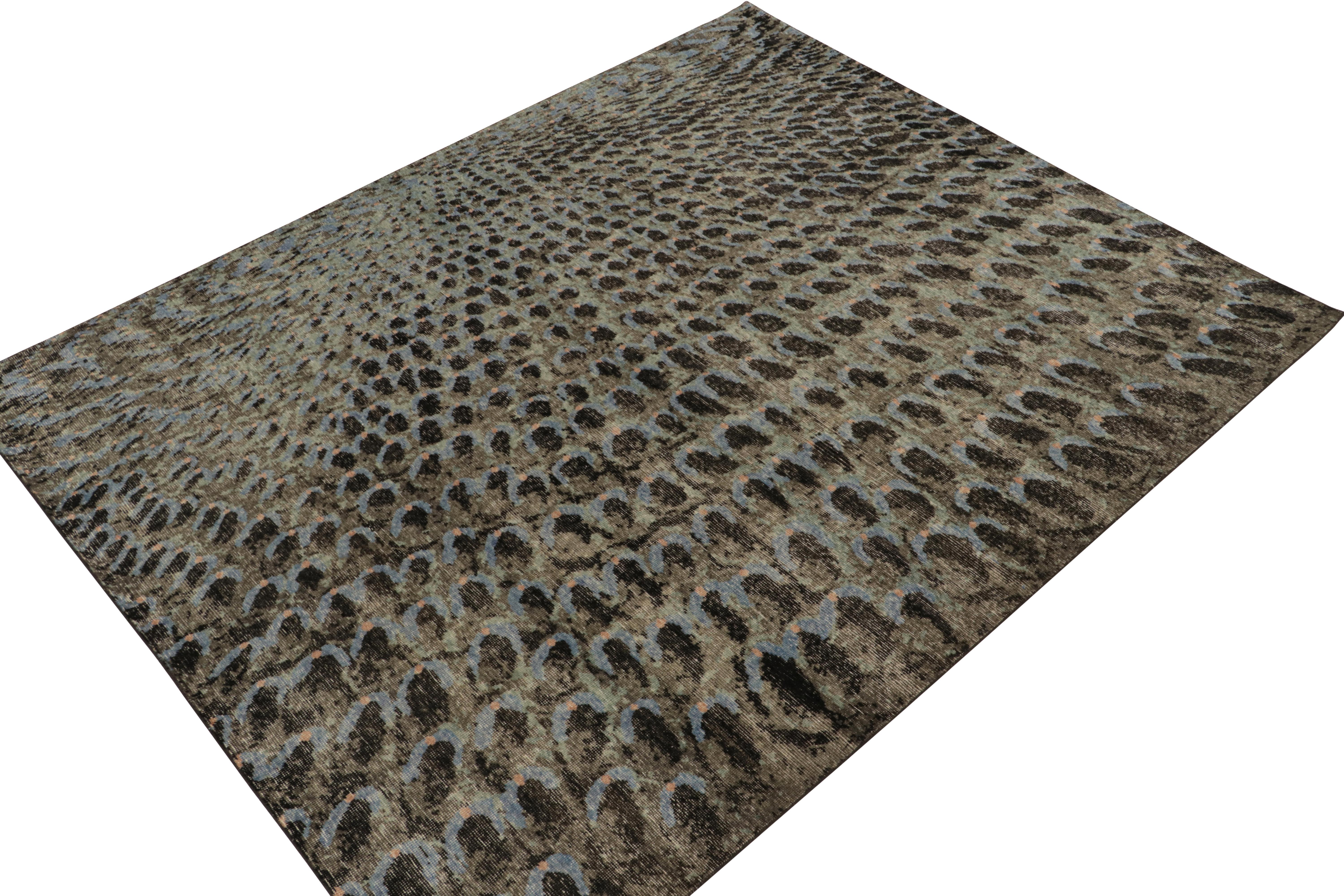 A scintillating 8x10 hand-knotted wool rug from Rug & Kilim’s Homage Collection. 

On the Design: This contemporary drawing is inspired by a mesmeric attitude of peacock feathers to create a whole new, bold modern look in green, blue & black.