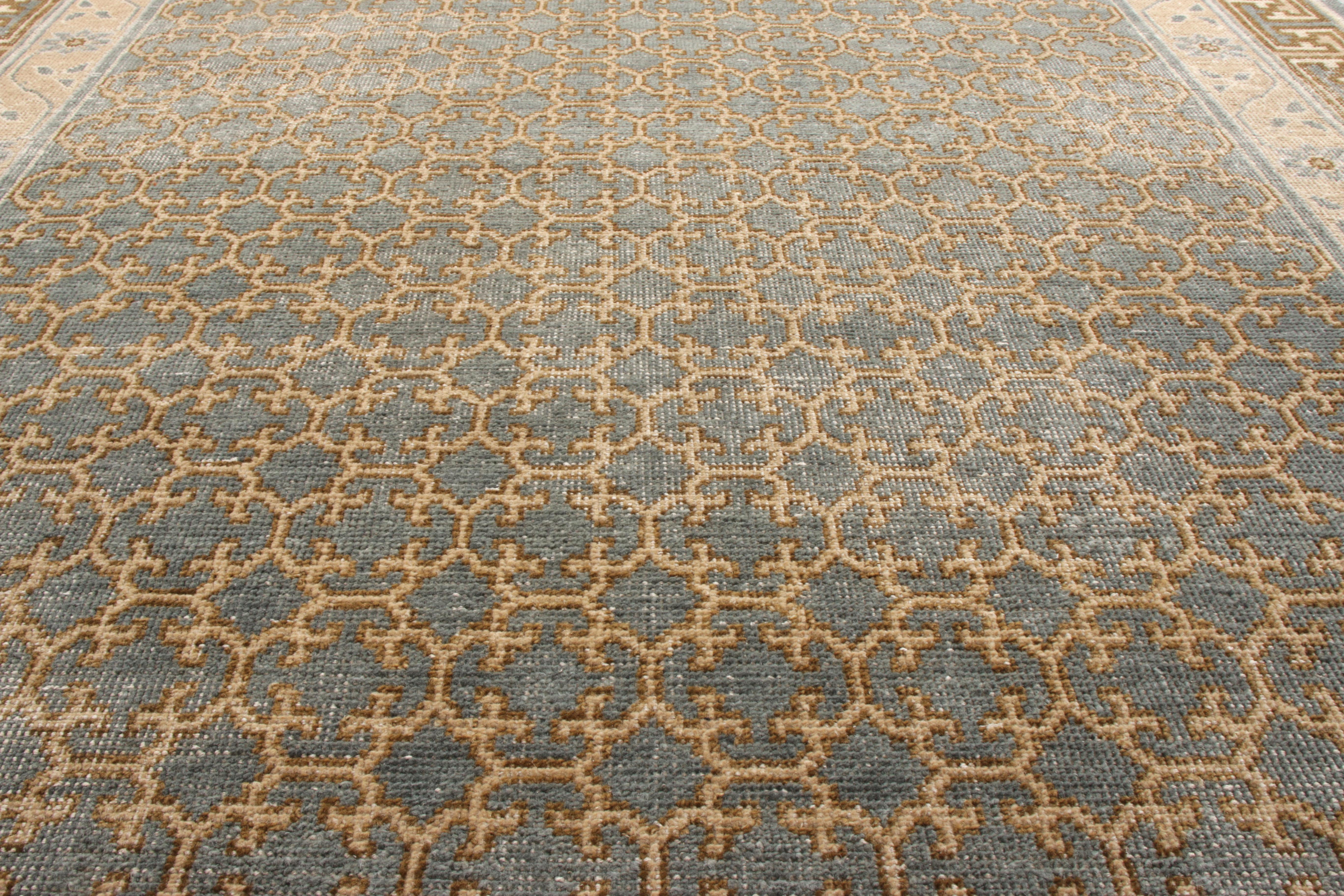 A hand-knotted wool custom rug design coming from Rug & Kilim’s Homage Collection. This 6 x 9 edition exemplified our distressed rendition of classic Khotan style where a uniform geometric pattern fills the field while being encased in a delicate