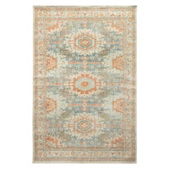 Rug & Kilim's Distressed Style Custom Rug in Orange, Blue Geometric Pattern (tapis personnalisé de style vieilli avec motifs géométriques orange et bleus)