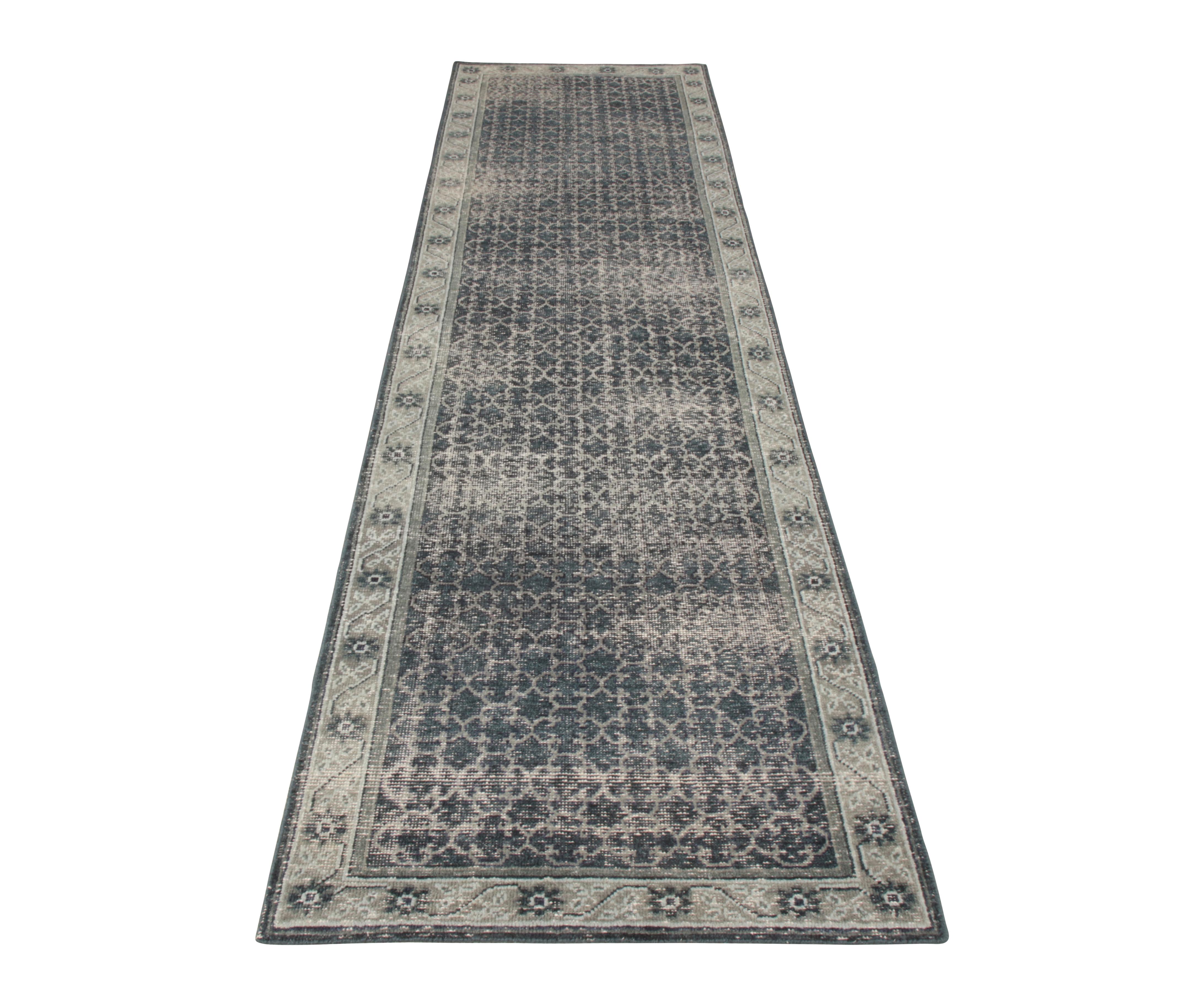 An ostentatious custom runner design from Rug & Kilim’s Homage Collection. This 3 x 12 edition of the runner boasts a calming personality in a soothing blue colorway that elegantly complements its intricate geometric pattern with subtle gray