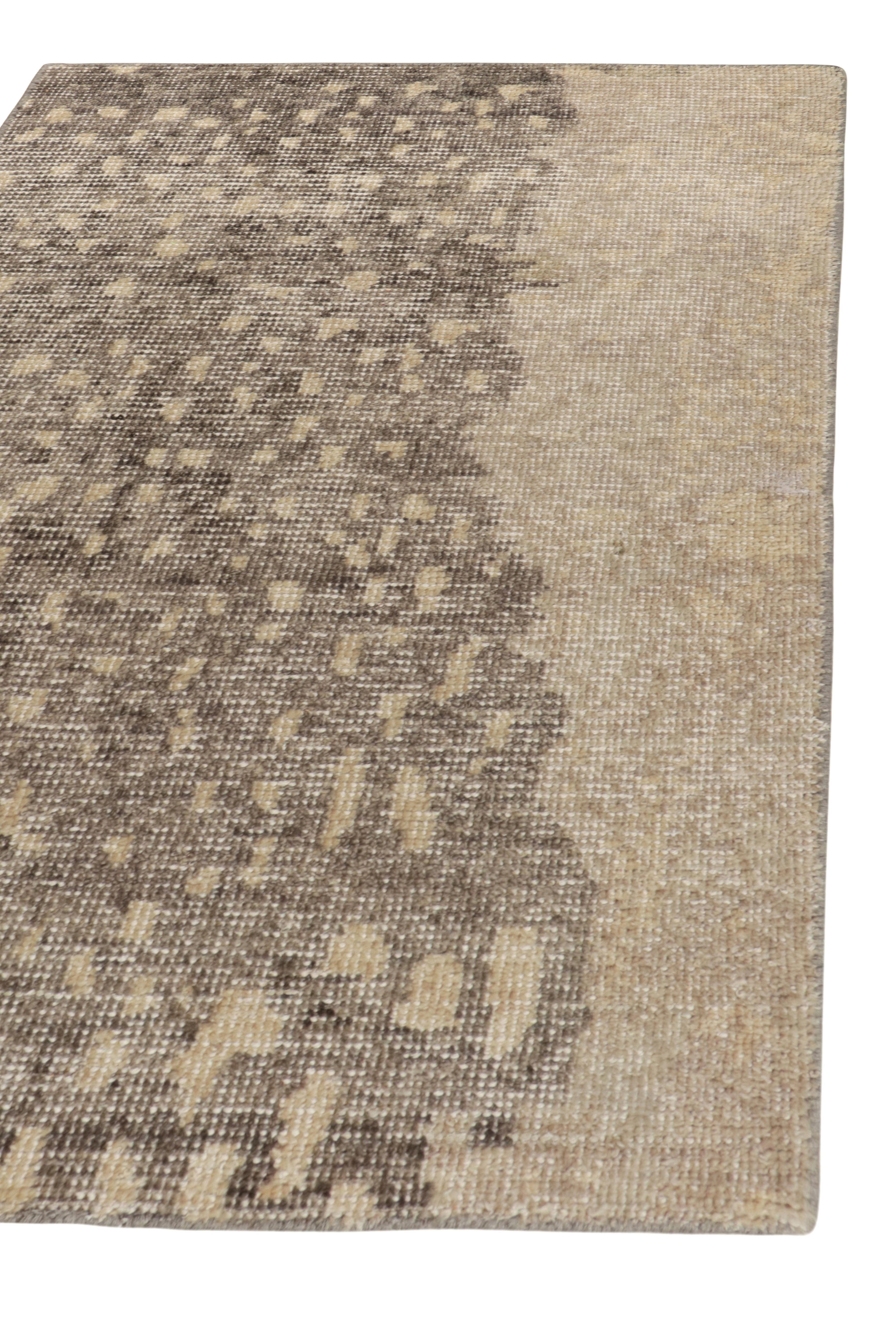 This 2x3 rug hails from the gift-size selections of Rug & Kilim’s Homage Collection, remarking a bold take on distressed style. This design evokes painterly abstract styles in comfortable beige-brown and gray notes, naturally complementing the