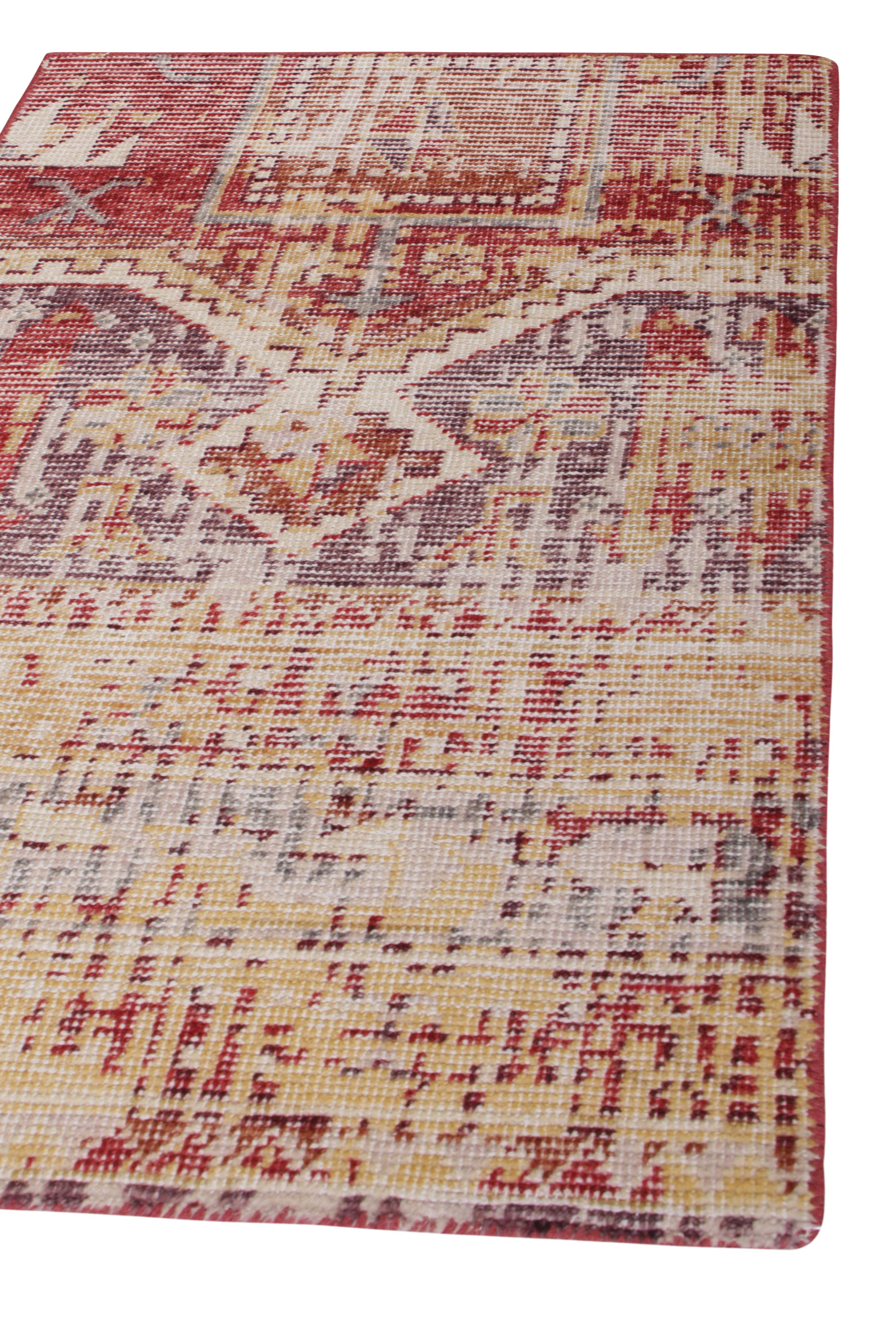 This 2x3 rug hails from the gift-size selections of Rug & Kilim’s Homage Collection, remarking a bold take on distressed style. This design recaptures classic rug styles with playful abstractions of tribal geometry in red, purple, and golden-beige.