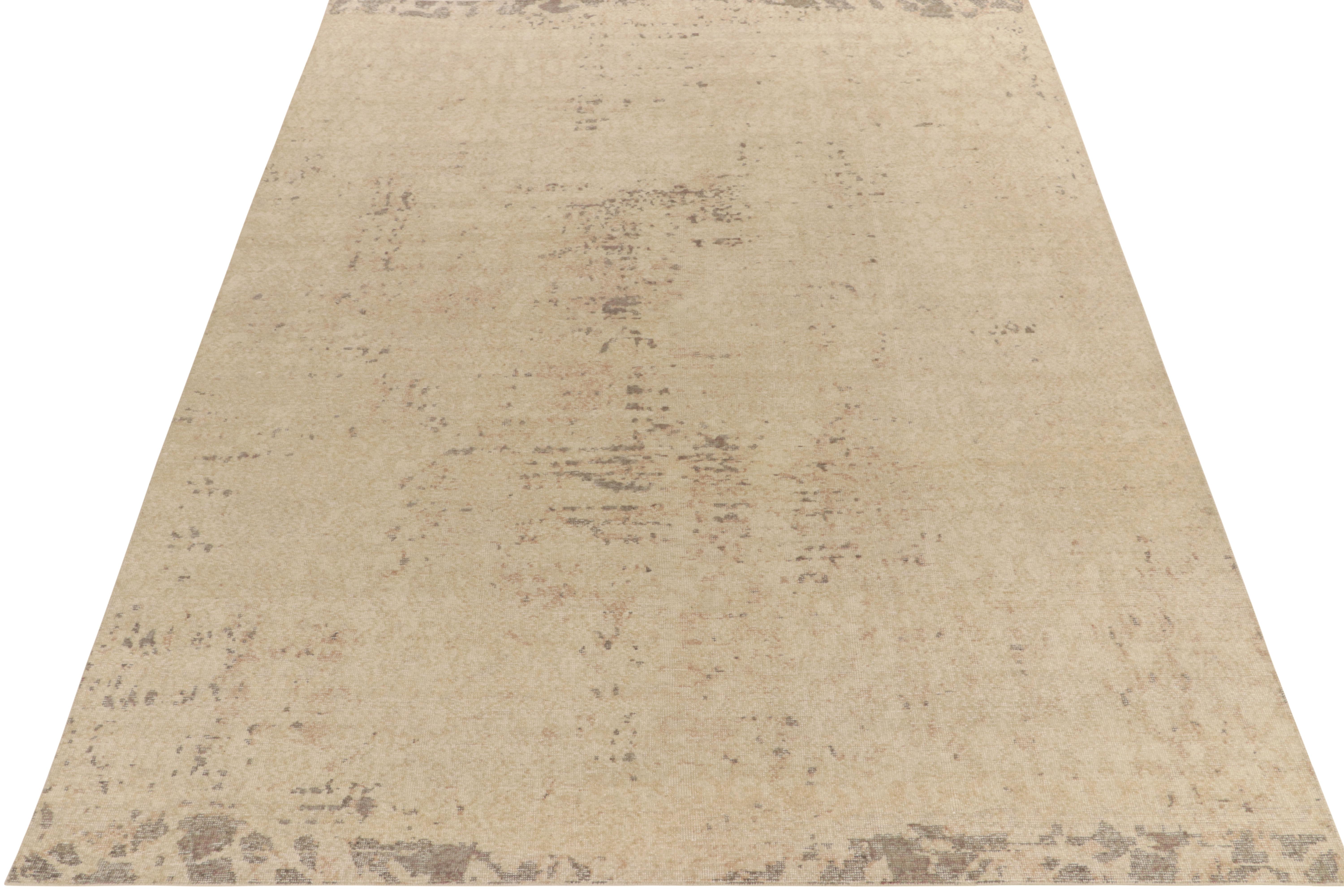 From Rug & Kilim’s Homage collection, a 9x12 distressed style abstract rug relishing a positive-negative play of luscious beige & brown for an alluring take on this celebrated line. Exemplifying the easy to maintain, comfortable wash achieving this