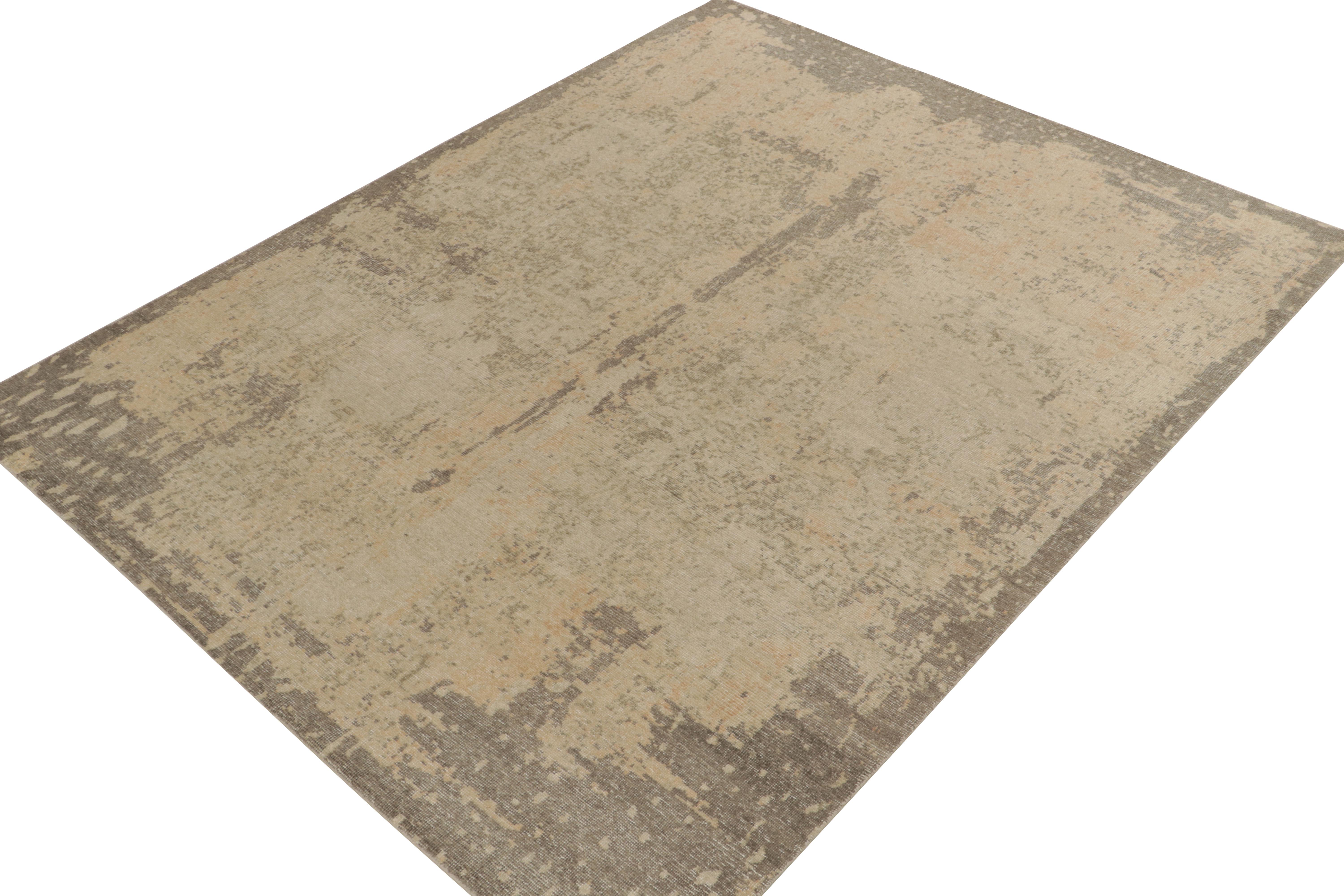 From Rug & Kilim’s Homage collection, an 8x10 distressed style abstract rug relishing a positive-negative play of luscious beige, brown & gold for an alluring take on this celebrated line. Exemplifying the easy to maintain, comfortable wash