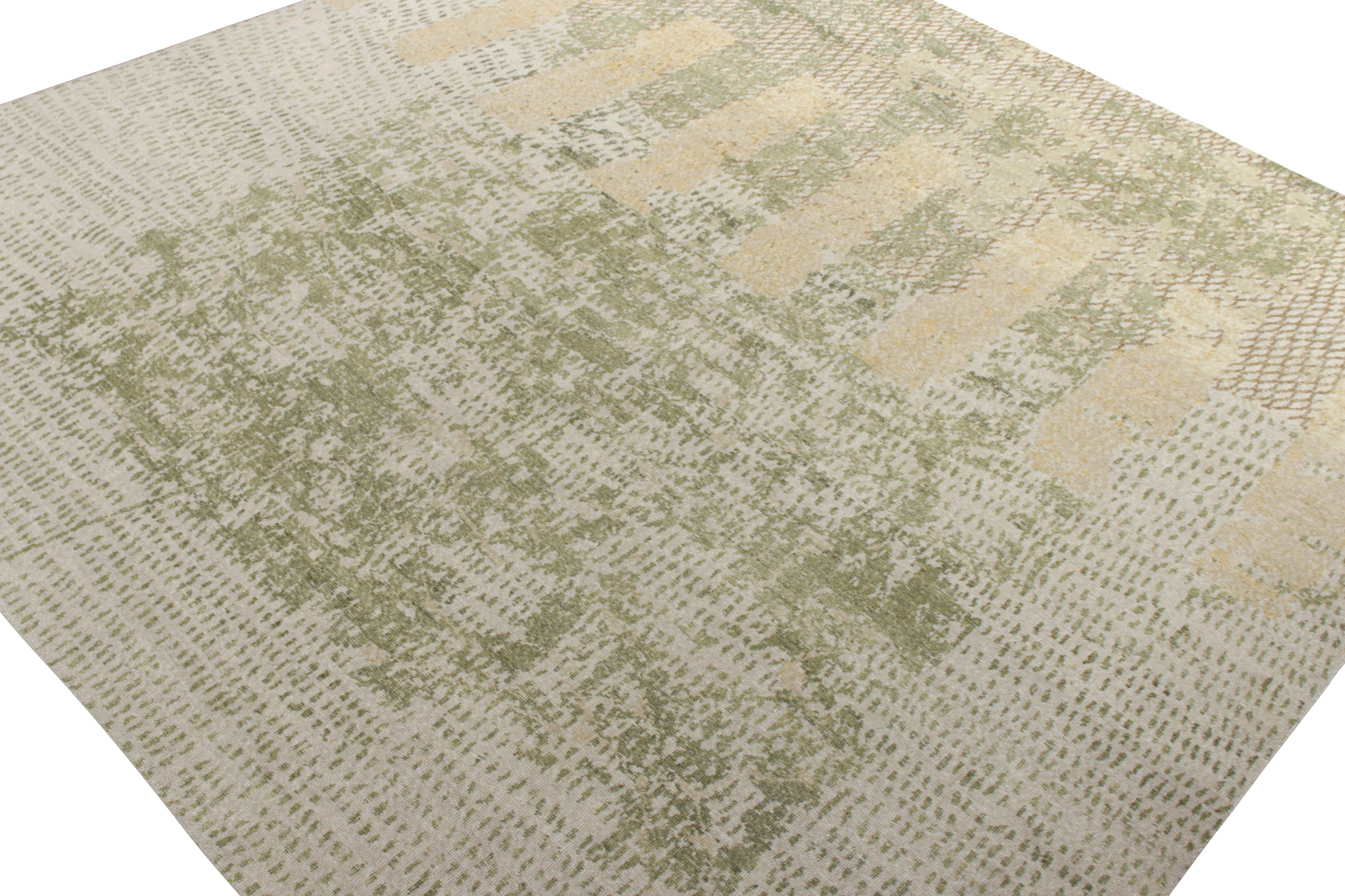 A 12X12 hand-knotted piece from Rug & Kilim’s Homage Collection. Donning a modern vibe, this piece is a crowning glory from our Dots Line. The rug features an abstract pattern in a dotted theme with a welcoming green, beige-brown, and gray abstract