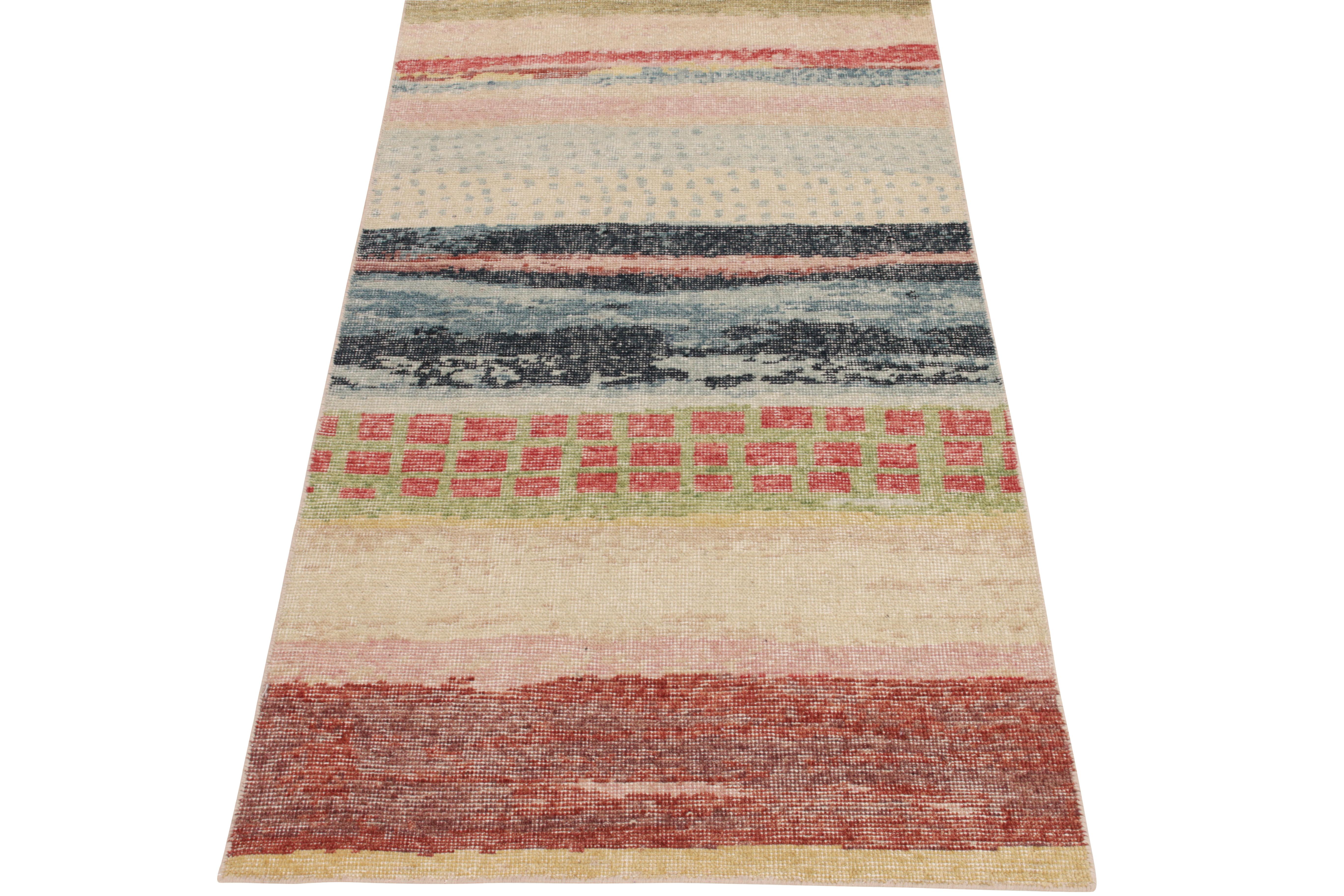 Hand-knotted in wool, a 3X6 runner from Rug & Kilim’s Homage collection showcasing impeccable pagination in an enticing color play of variegated shades in blue, red, green & pastel pink uniquely complementing the distressed vibe of this line.