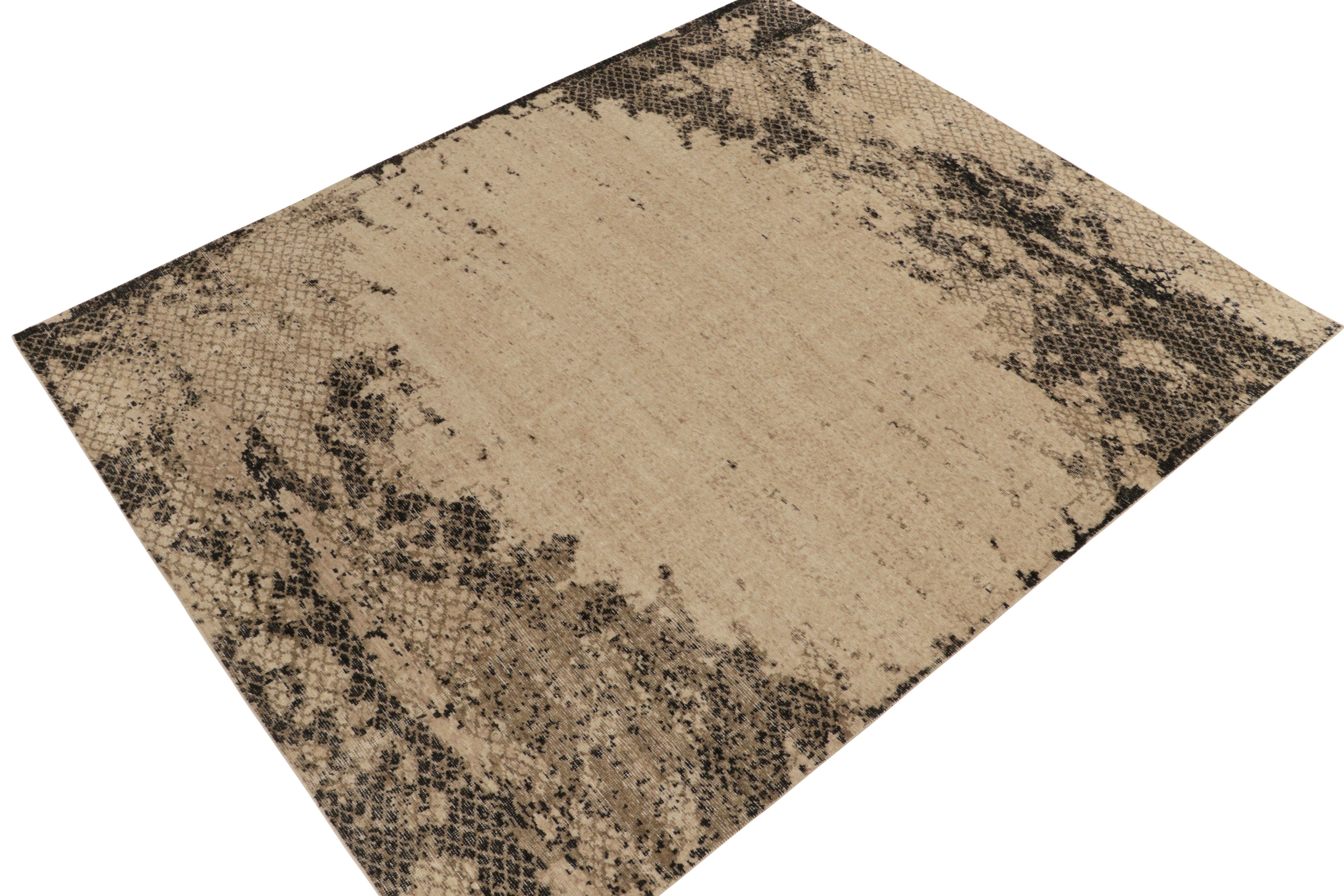 A scintillating 8 x 10 hand-knotted wool rug from Rug & Kilim’s Homage Collection—a smart encyclopedia of patterns and iconic aesthetics. This creation is inspired by abstract rugs with a more bold use of negative space in beige-brown and black,