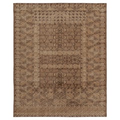 Alfombra Rug & Kilim de estilo envejecido con motivos tribales en beige y marrón