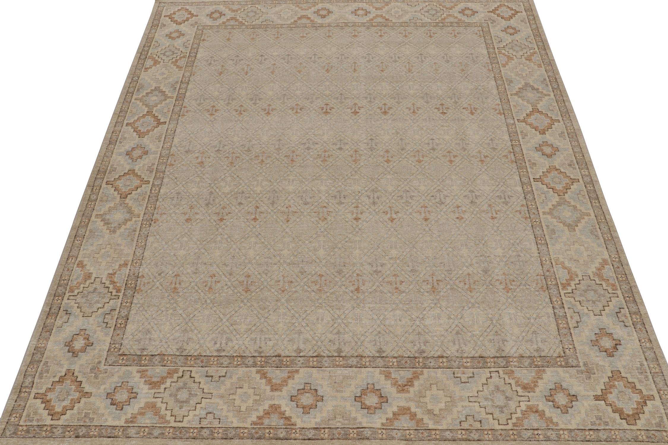 ??This 8x10 rug is a new addition to the Homage Collection by Rug & Kilim.

Further On the Design: 

Hand knotted in wool and cotton, this piece enjoys an elaborate geometric pattern in forgiving beige, gray, and blue. Keen eyes will admire a
