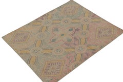 Rug & Kilim’s Distressed Style Rug in Blue, Pink, Gold Trellises