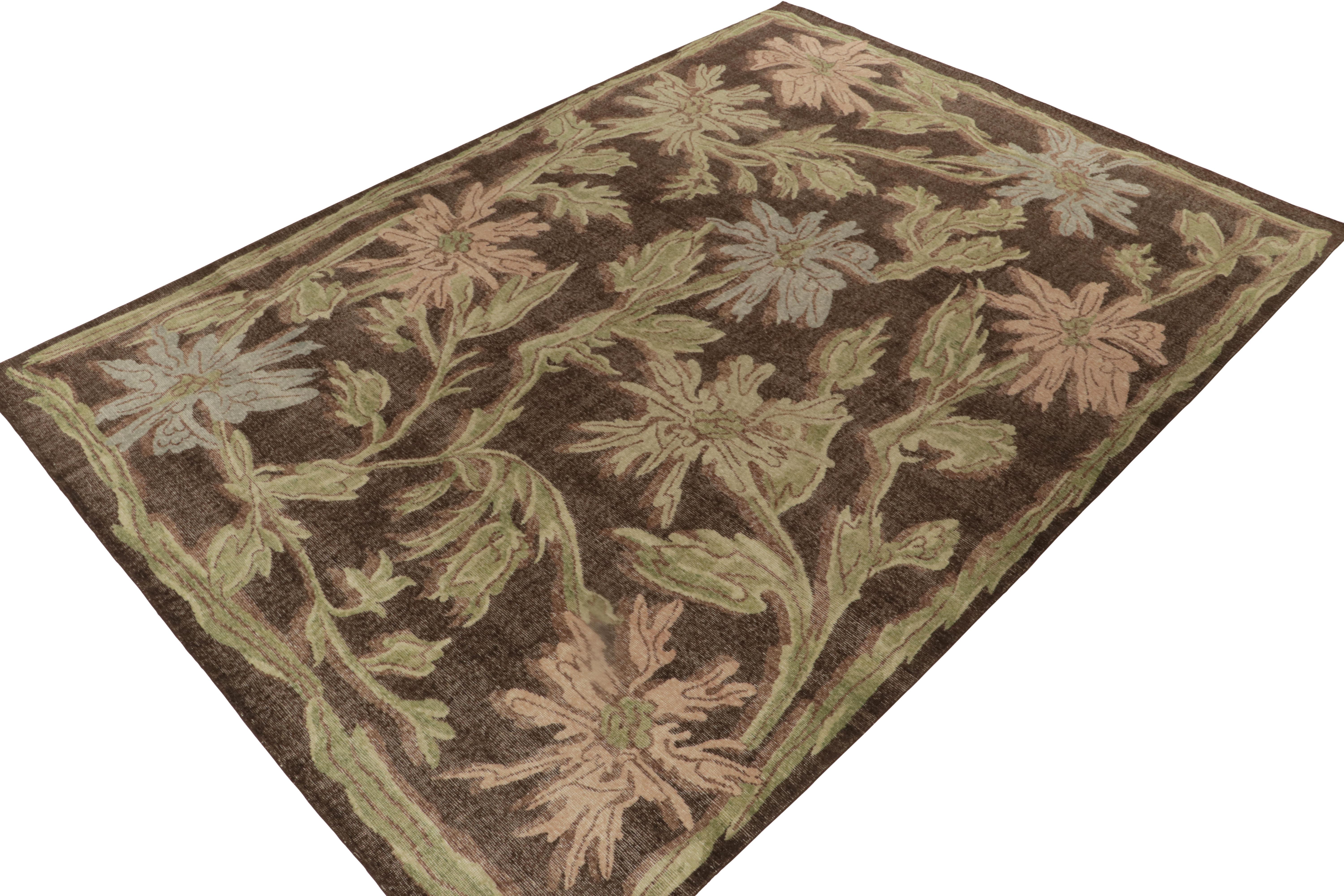 From Rug & Kilim’s Homage Collection, a 10x14 hand-knotted wool rug recapturing whimsical botanical designs in a delicious new texture. 

On the Design: This contemporary piece enjoys a play of chocolate brown & green with pink & blue accents in