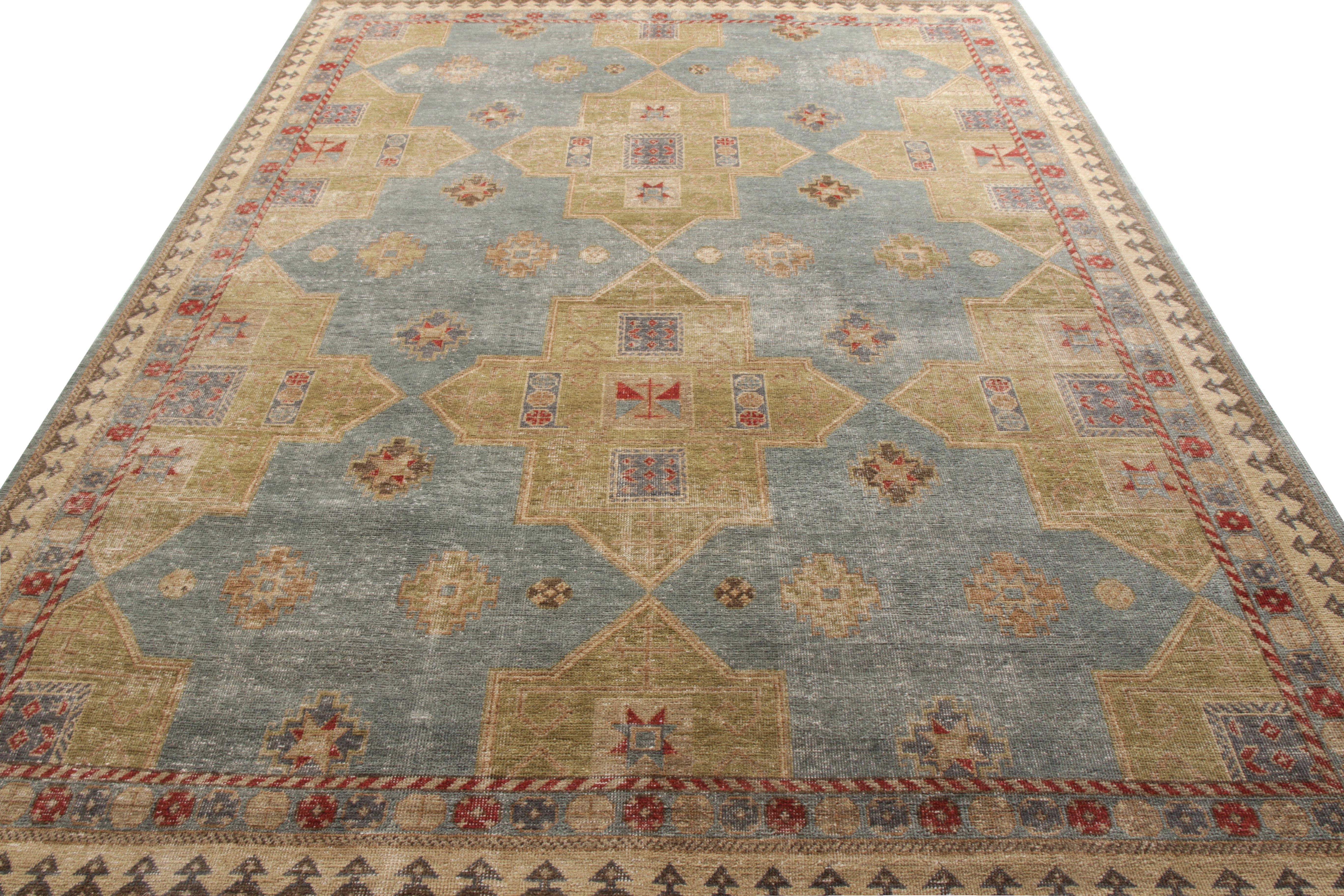 A scintillating 9 x 12 rendition of traditional style by Rug & Kilim entering its prestigious Homage collection. Hand knotted in wool, the open field enjoys a unique take on Caucasian rug aesthetics in an uncommon green and blue, accented by beige