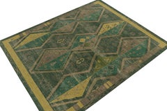Rug & Kilim’s Distressed Style Rug in Green & Brown Geometric Patterns