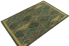 Rug & Kilim’s Distressed Style Rug in Green & Brown Geometric Patterns