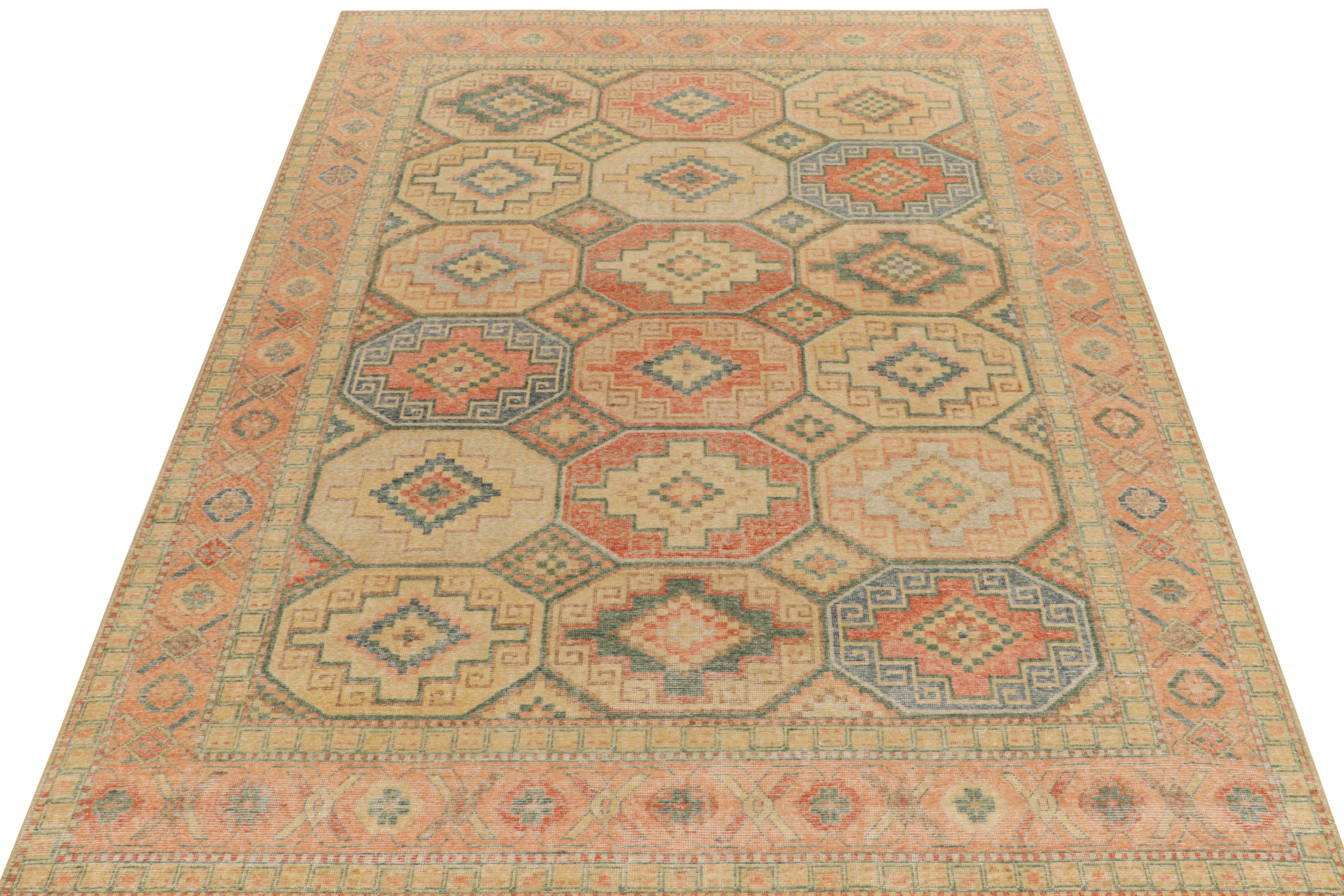 A 9x12 distressed style rug from Rug & Kilim’s Homage collection, thriving on inspiration from a tribal geometric pattern in muted tangerine, blue & beige hues. Connoisseurs may note traditional motifs decorating the borders in similar colorways.