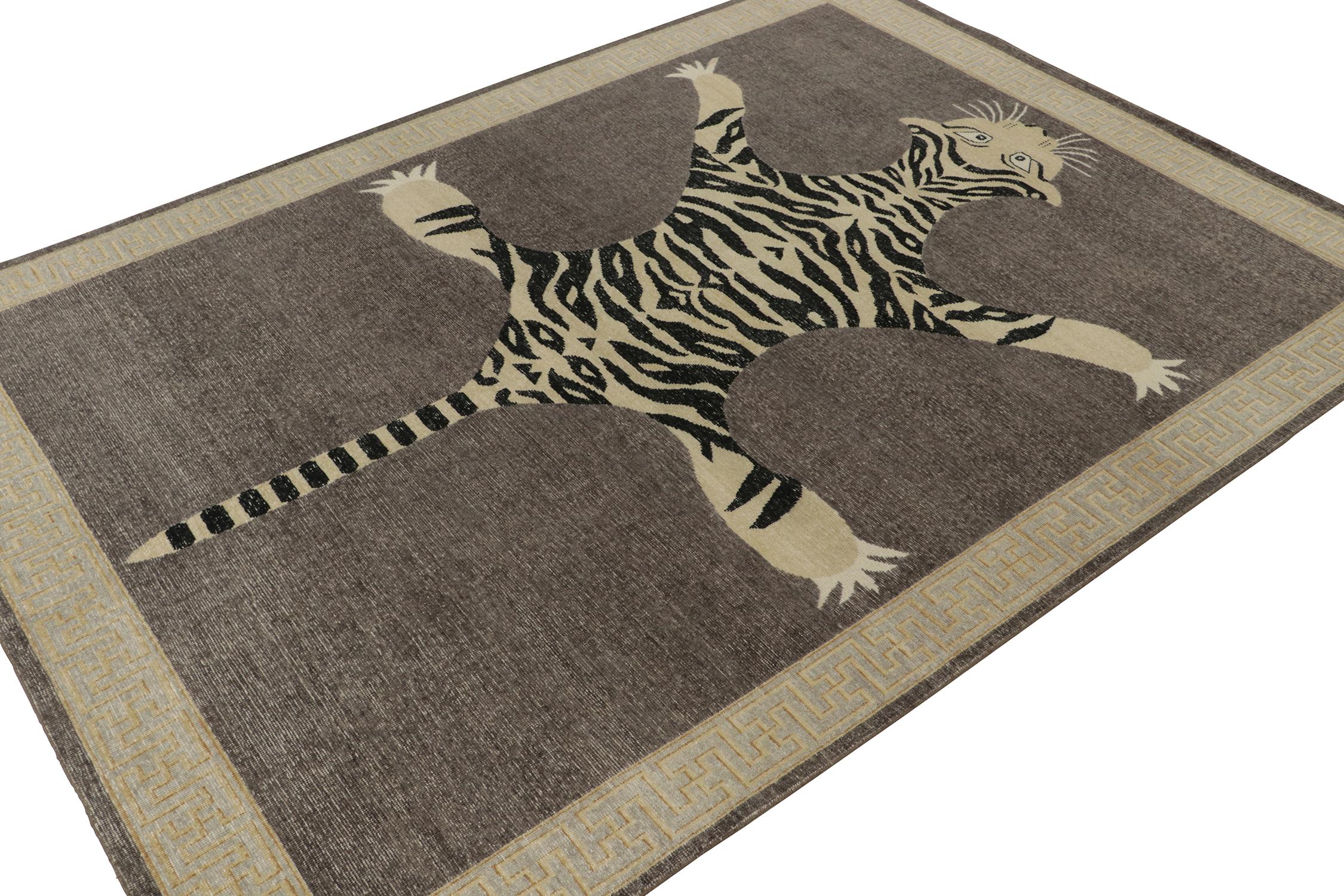 This hand-knotted wool 9x12 rug from Rug & Kilim’s Homage Collection recaptures the time-honored Tiger skin rug style.

Further On the Design: 

This particular piece is inspired by antique Indian Tiger-skin rugs of the most regal, graphic