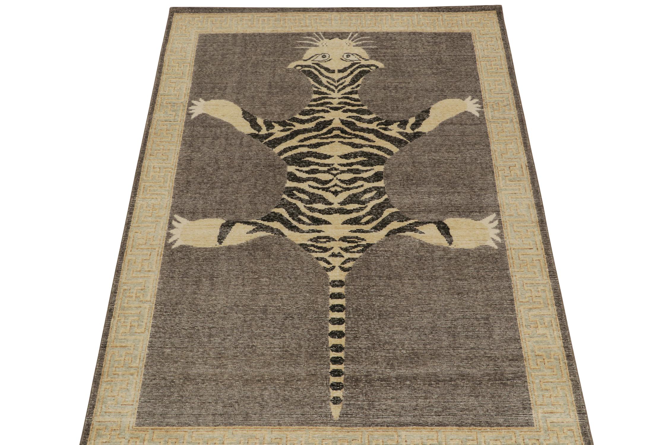 This hand-knotted wool 6x9 rug from Rug & Kilim’s Homage Collection recaptures the time-honored Tiger skin rug style.

Further On the Design: 

This particular piece is inspired by antique Indian Tiger-skin rugs of the most regal, graphic