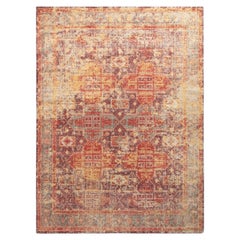 Rug & Kilim è un tappeto di transizione in stile degradato con motivo geometrico rosso e viola.