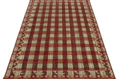 Rug & Kilim’s Distressed Swedish Style Rug in Red and Brown Geometric Pattern