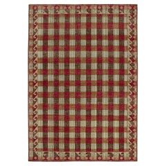 Rug & Kilim's "Distressed" Teppich im schwedischen Stil mit rotem und braunem geometrischen Muster