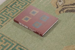 Rug & Kilim’s Distressed Tiger Rug in Green with Beige and Brown Pictorial